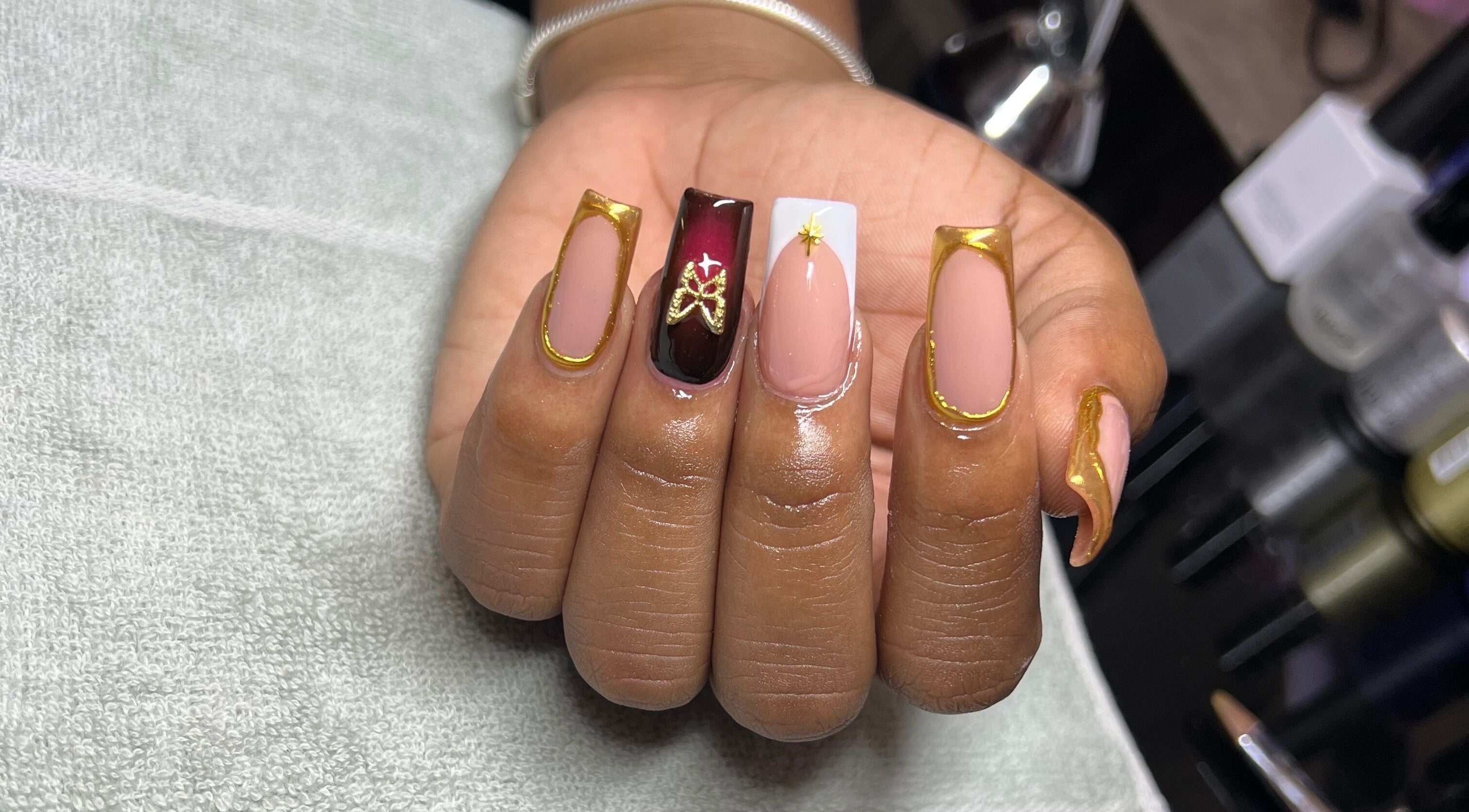 Stunning gold-accented nail art at Luxe Nails by Sher, Montego Bay, St. James Parish, JM.