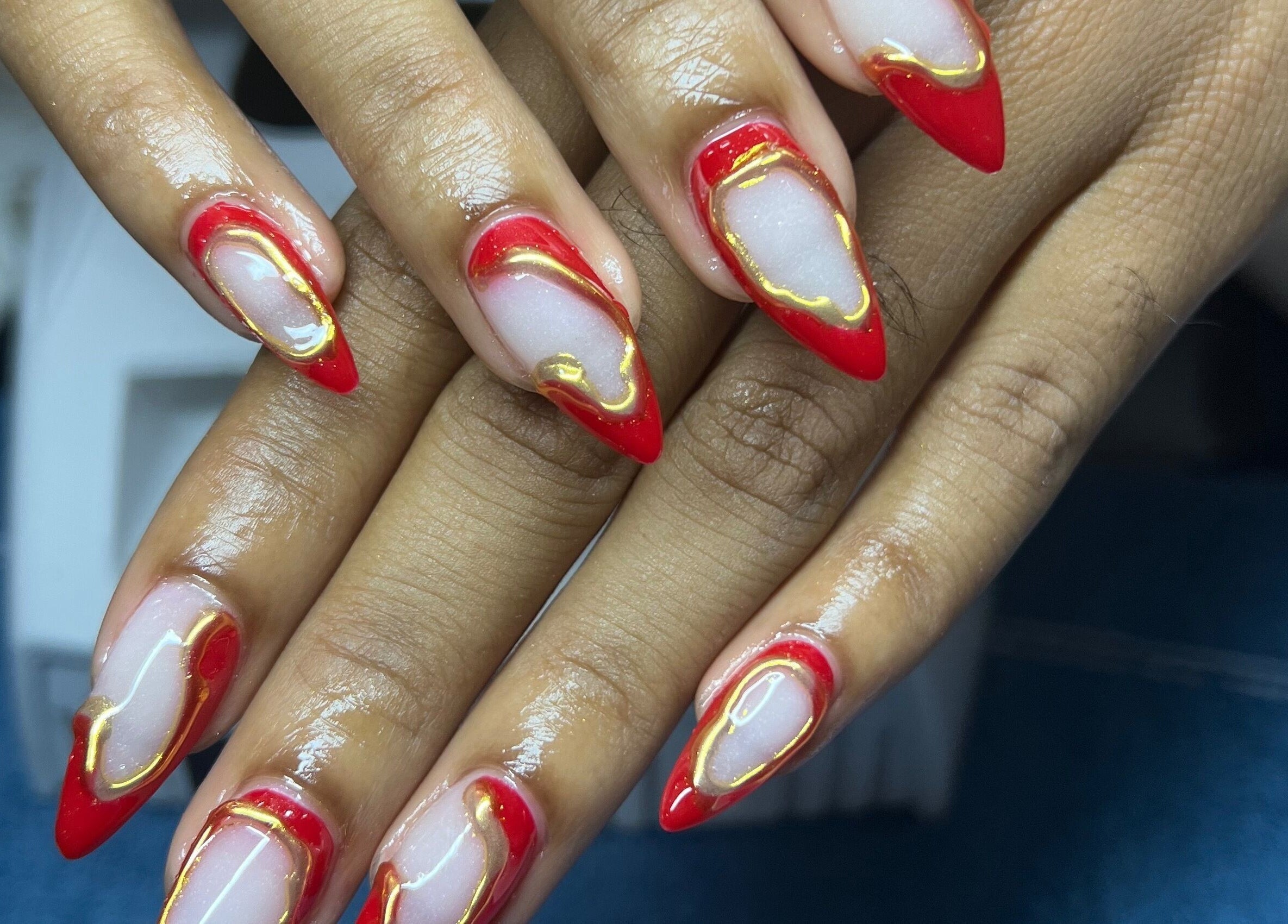 Elegant red and gold nail art at Luxe nails by Sher, Montego Bay, St. James Parish, JM.
