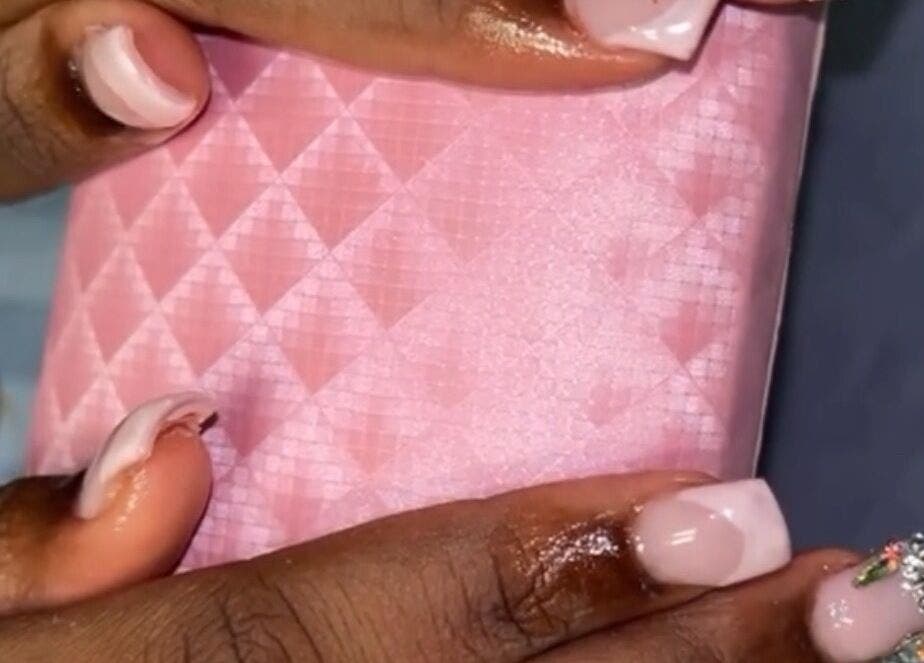 Stylish pink manicure with gems at PolishedByQ, Beltsville, Maryland, US.