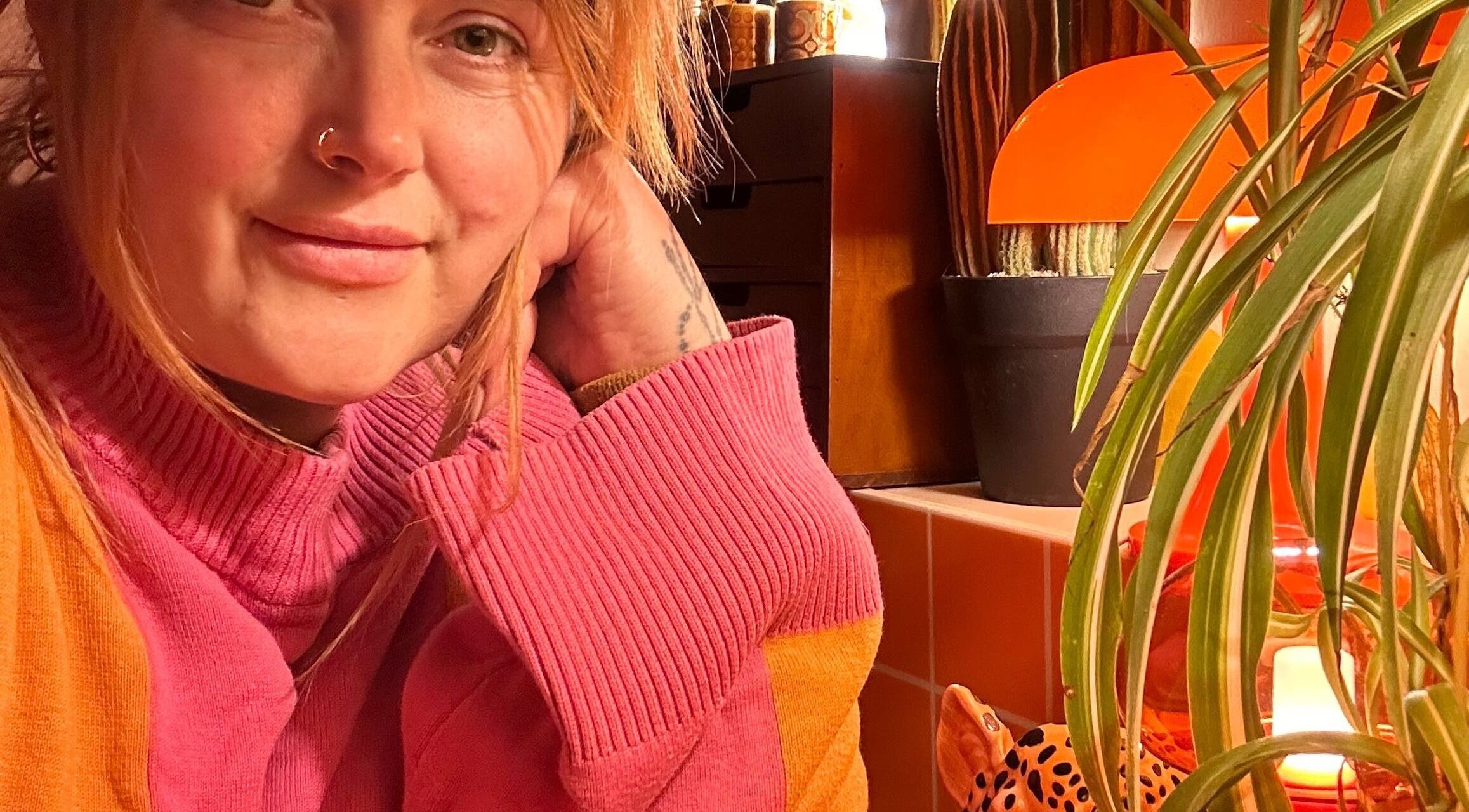 Warm, inviting corner at Emily Gossip Nails, Winscombe, England, GB featuring vibrant decor.