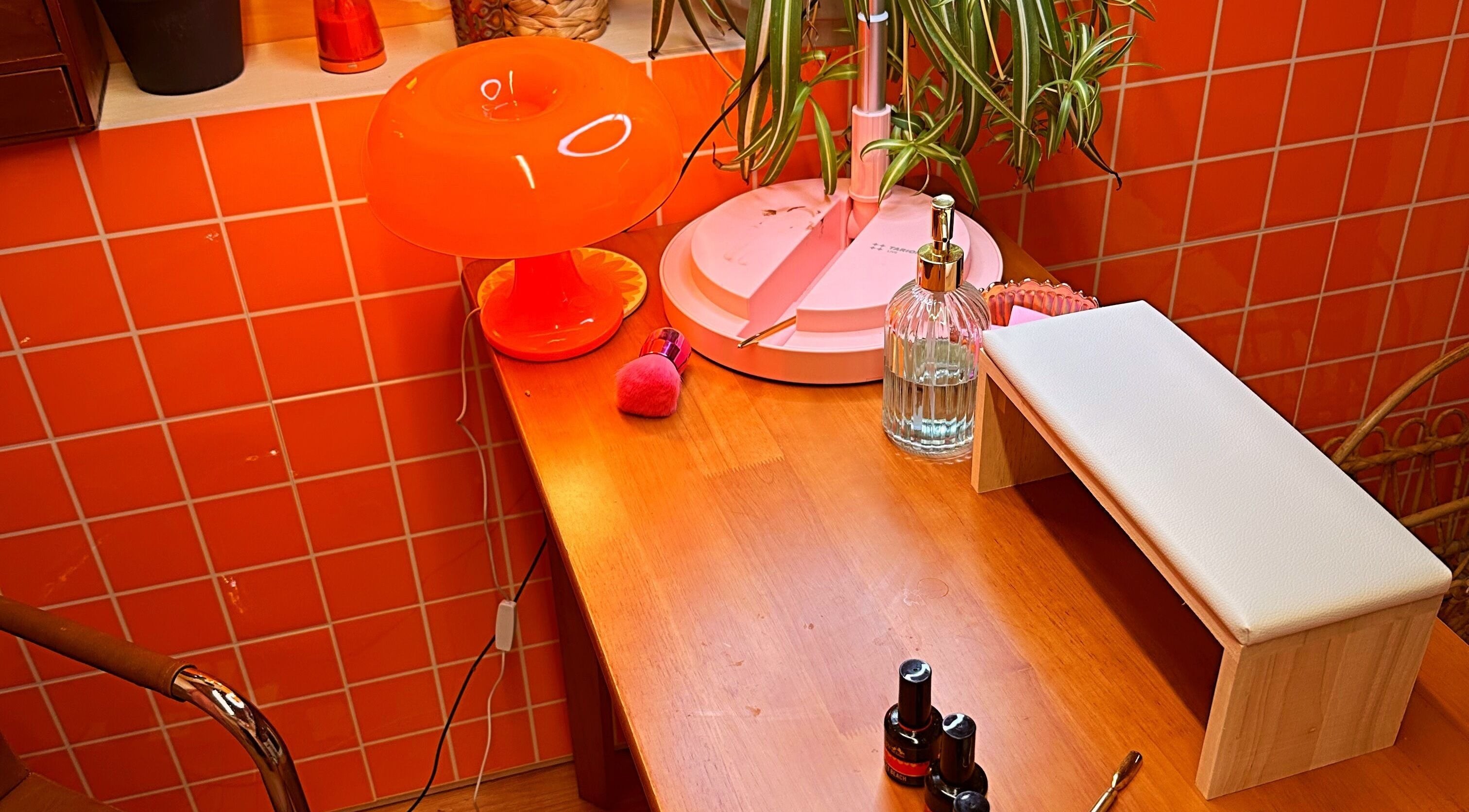 Chic nail station at Emily Gossip Nails, Winscombe, England, GB with vibrant decor and nail supplies.