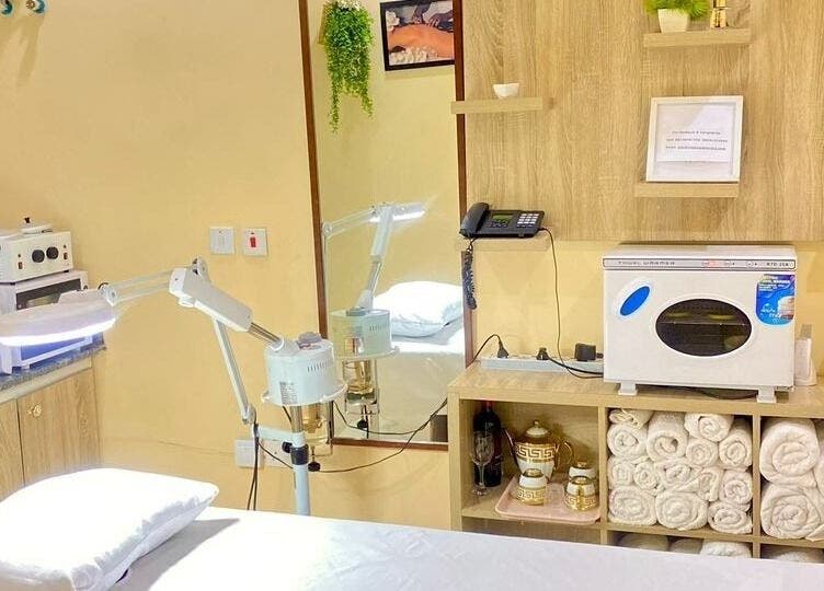 Relaxing treatment room at Moglow Beauty Spa, Abuja, Federal Capital Territory, NG, featuring modern equipment.