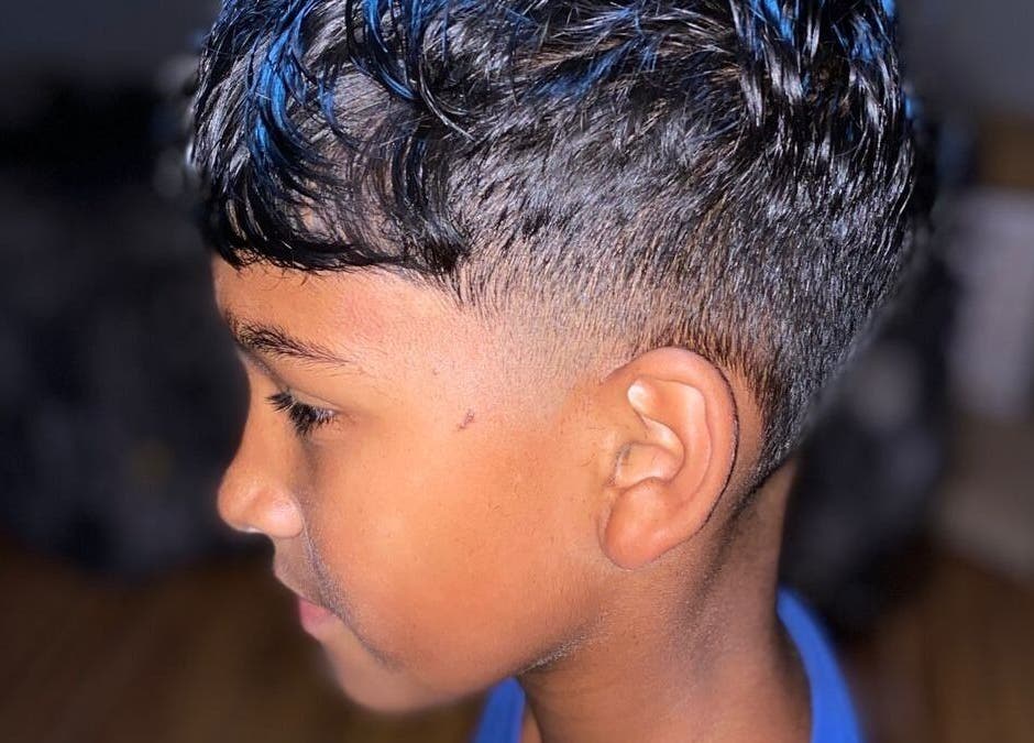 Close-up of a stylish fade haircut at Seth’s Parlor in Cape Town, Western Cape, ZA.