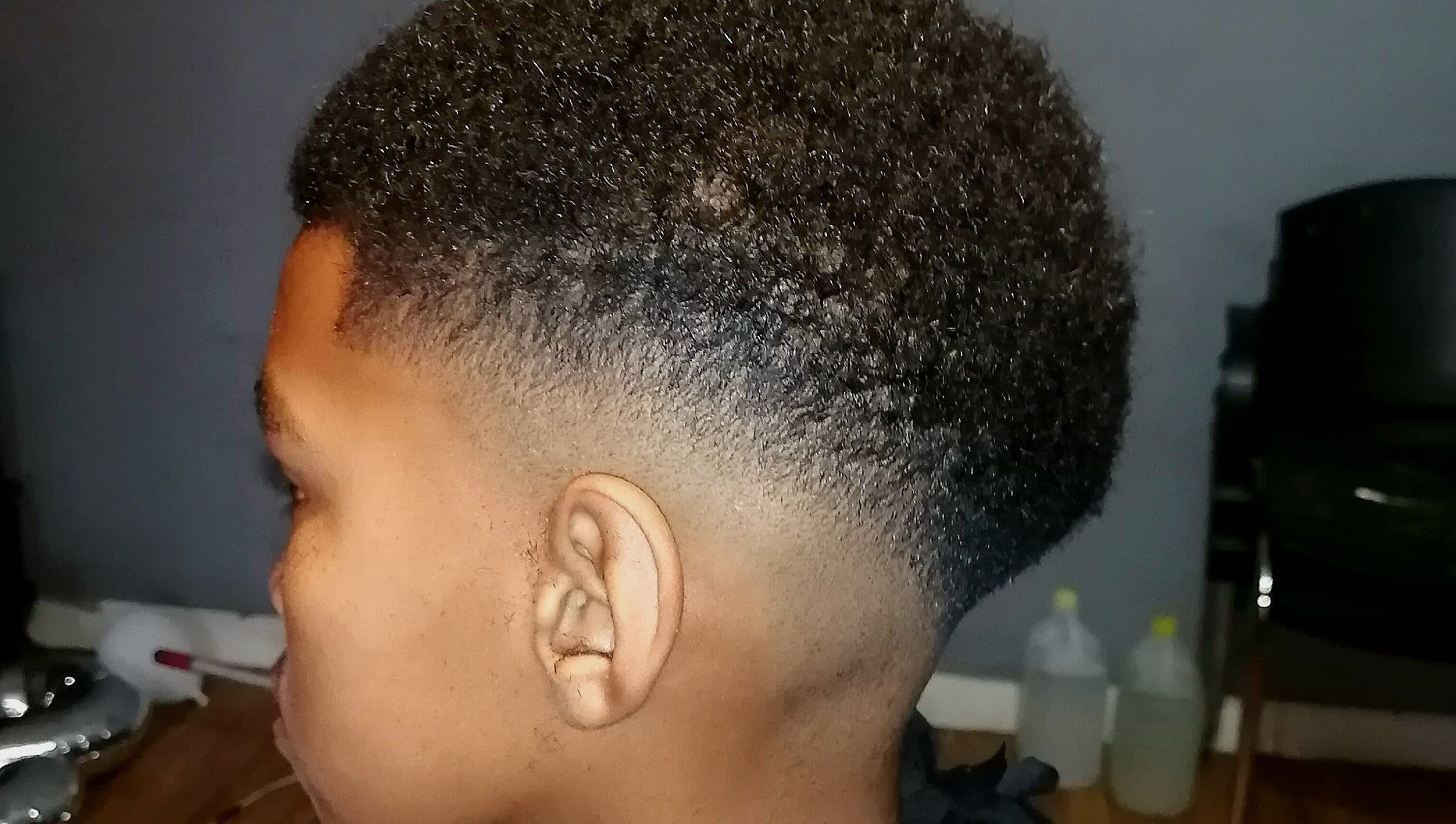 Close-up of a stylish fade haircut at Seth's Parlor, Cape Town, Western Cape, ZA.