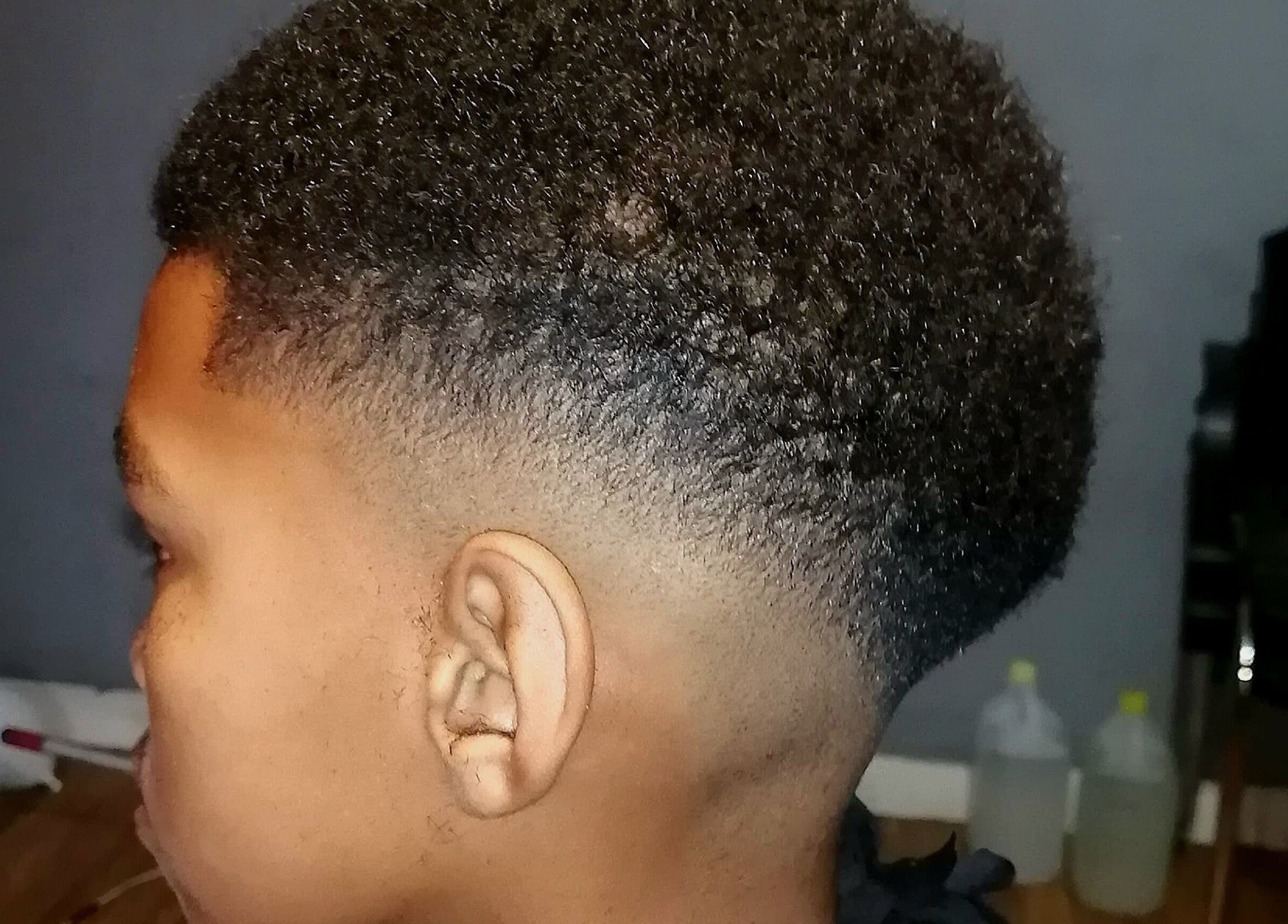 Close-up of a stylish fade haircut at Seth's Parlor, Cape Town, Western Cape, ZA.