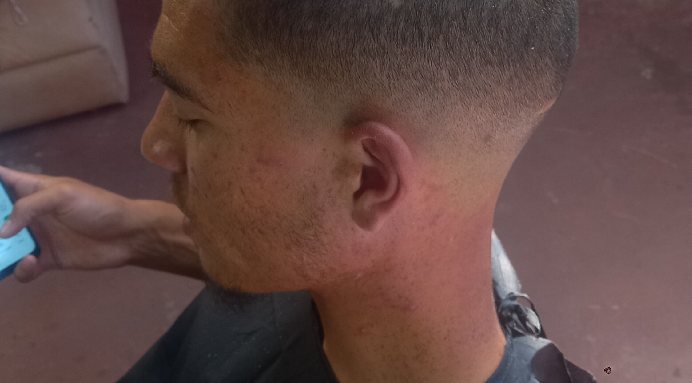 Close-up of stylish fade haircut at Seth's Parlor, Cape Town, Western Cape, ZA.