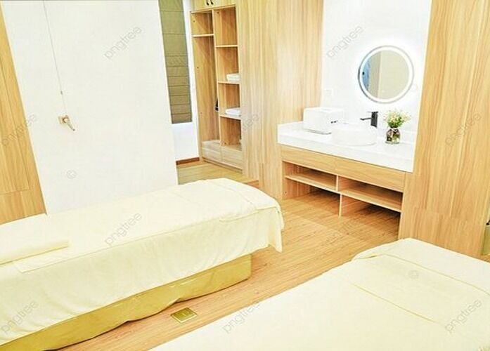 Spa room at Makeup, beauty and skincare services, Edgewood, Washington, US, featuring two massage tables.