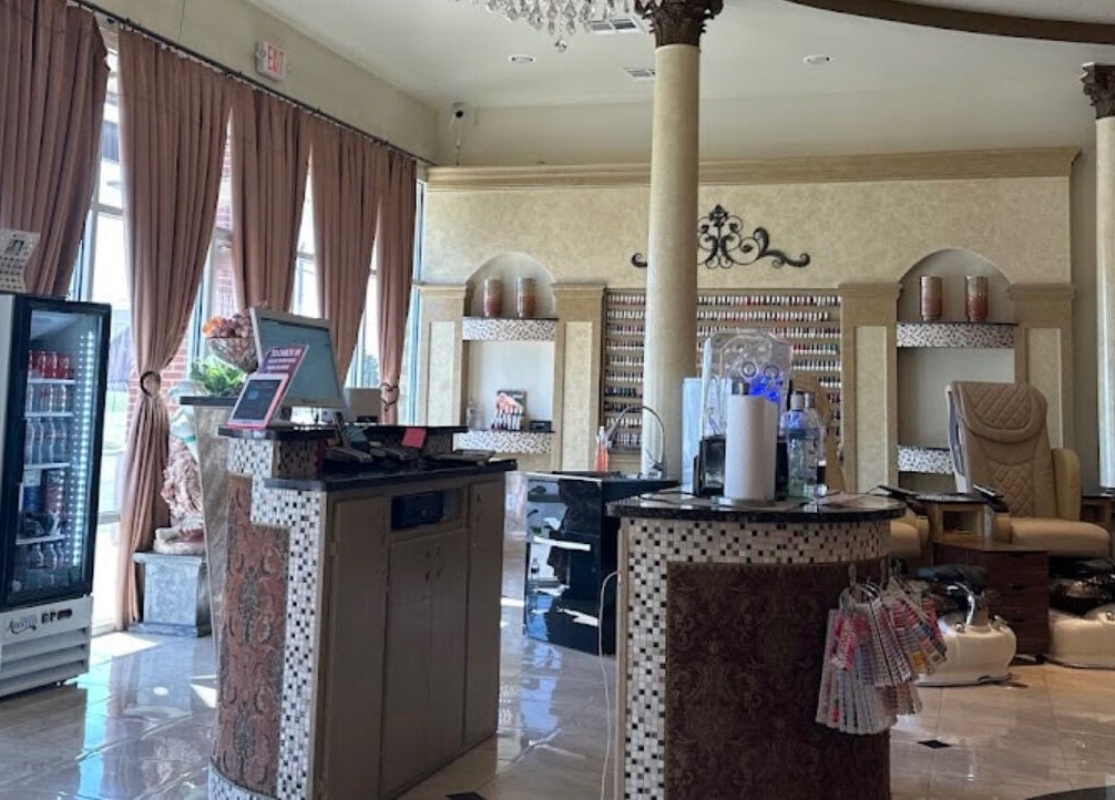 Elegant interior of Shellac Nail & Spa, Oklahoma City, Oklahoma, featuring posh seating and decor.
