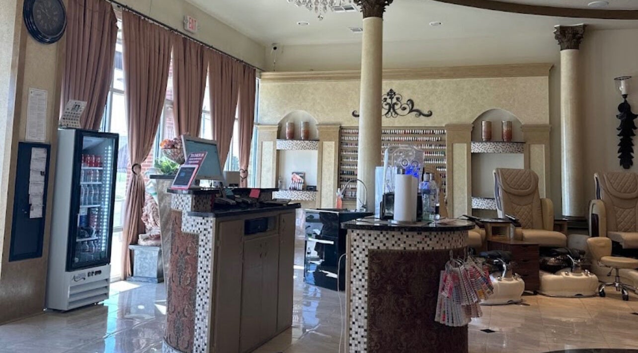Elegant interior of Shellac Nail & Spa, Oklahoma City, Oklahoma, featuring posh seating and decor.