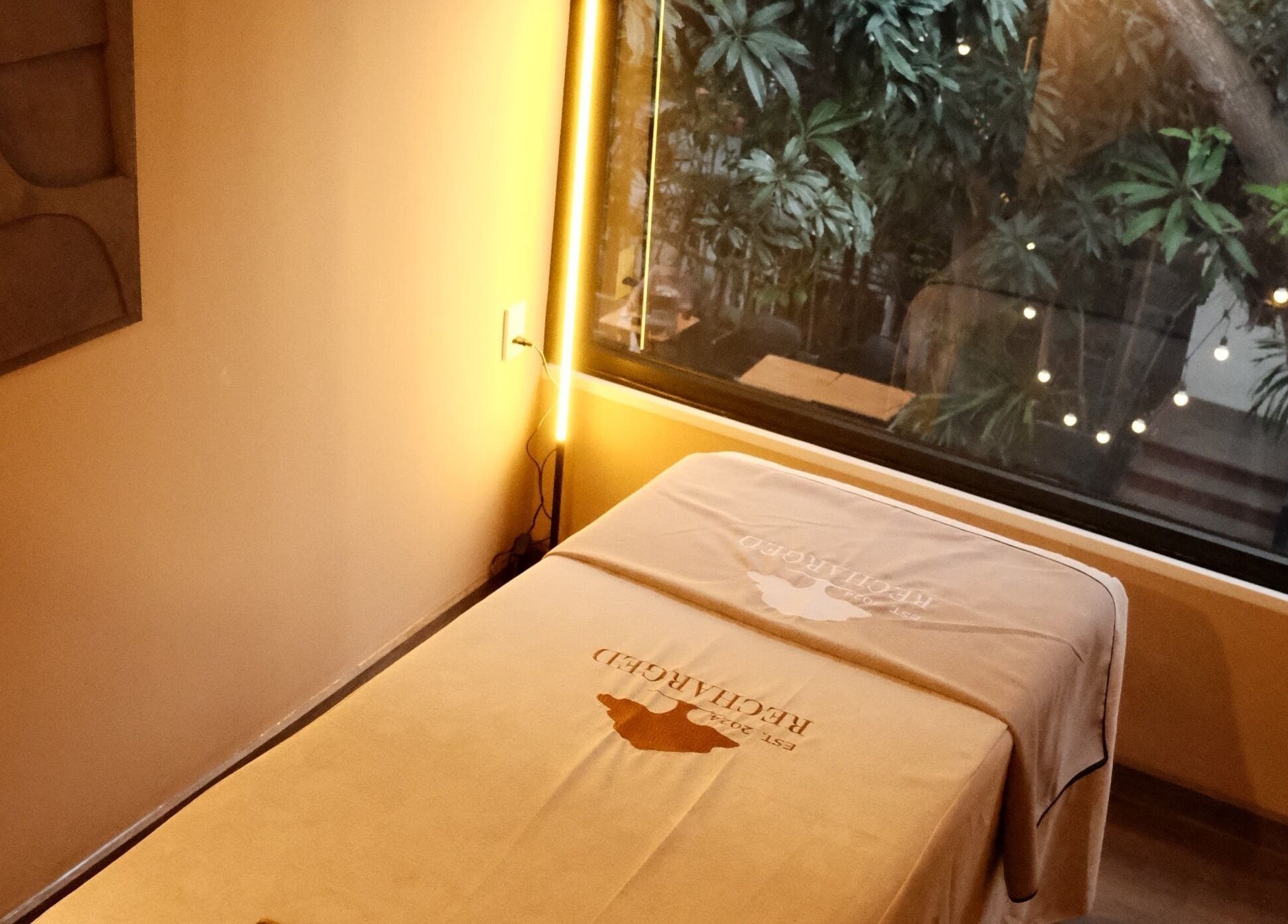 Tranquil massage room with lush view at Recharged SPA, Đà Nẵng, Đà Nẵng, VN.