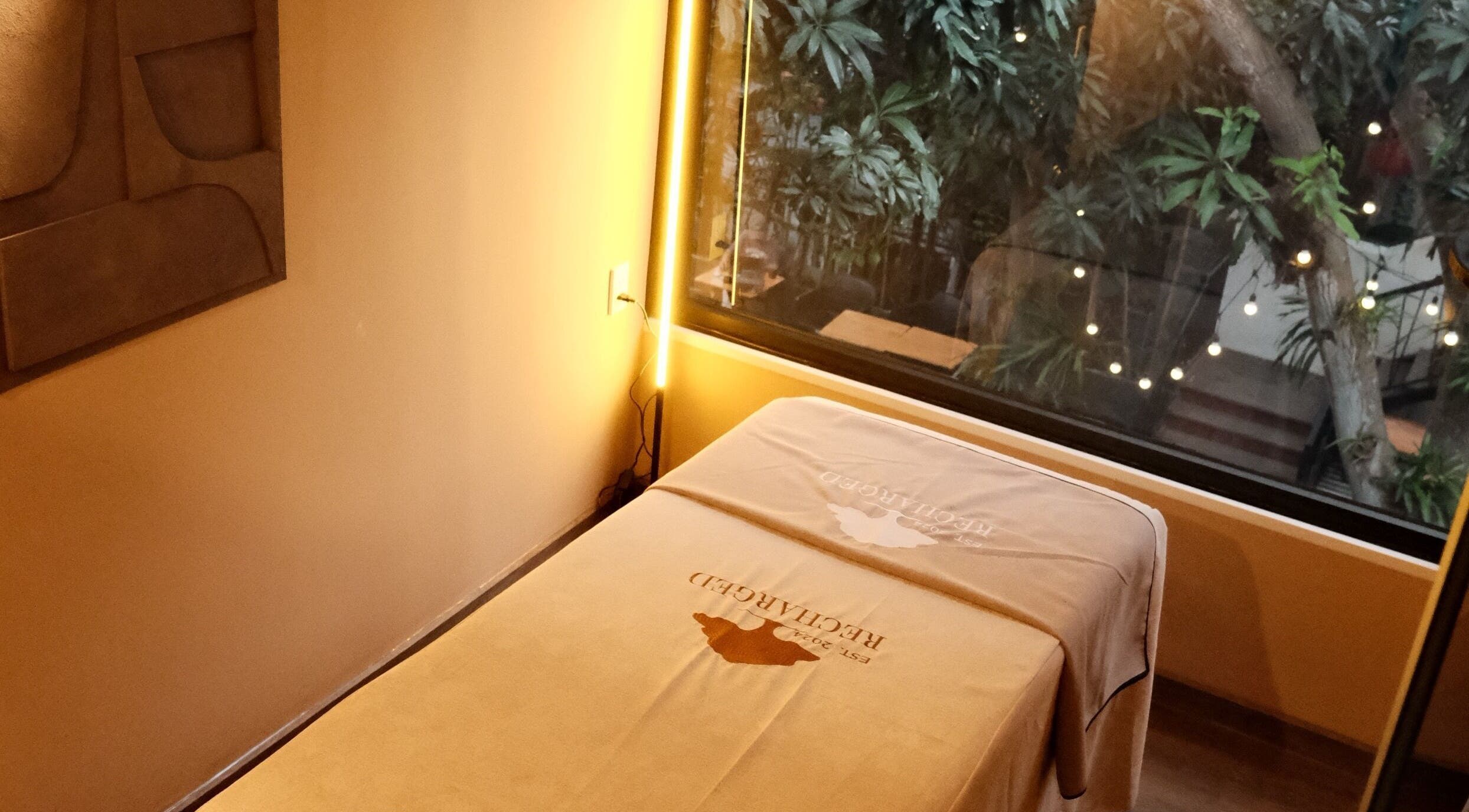 Tranquil massage room with lush view at Recharged SPA, Đà Nẵng, Đà Nẵng, VN.