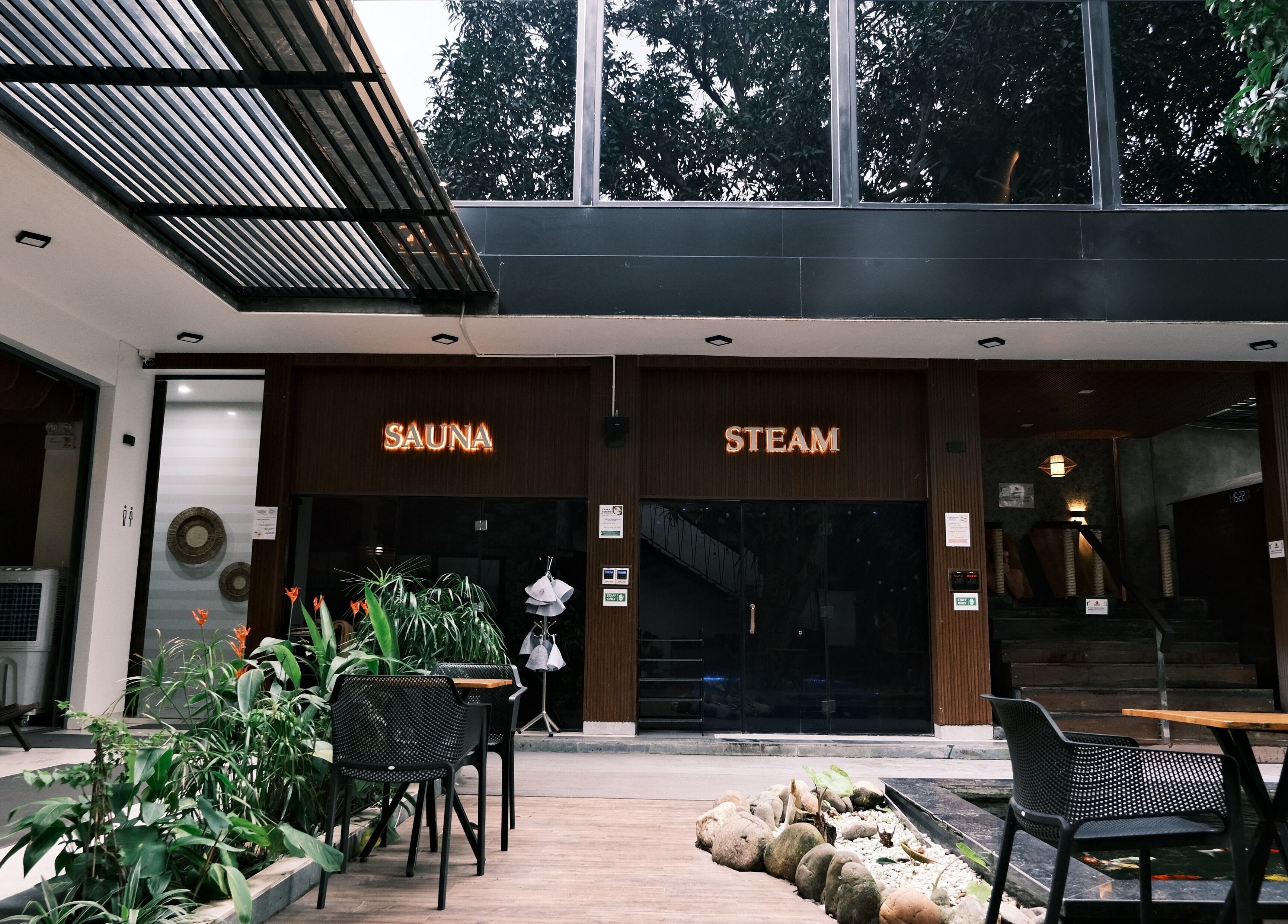 Outdoor view of Recharged SPA sauna and steam room, adorned with plants, Đà Nẵng, Đà Nẵng, VN.