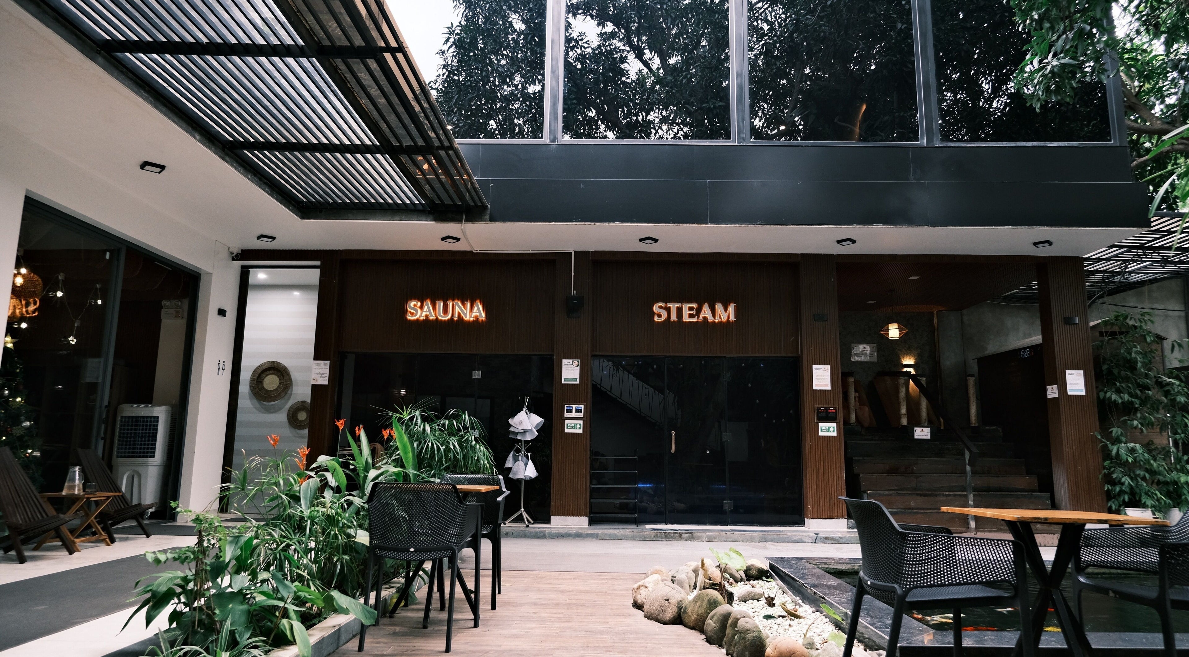 Outdoor view of Recharged SPA sauna and steam room, adorned with plants, Đà Nẵng, Đà Nẵng, VN.