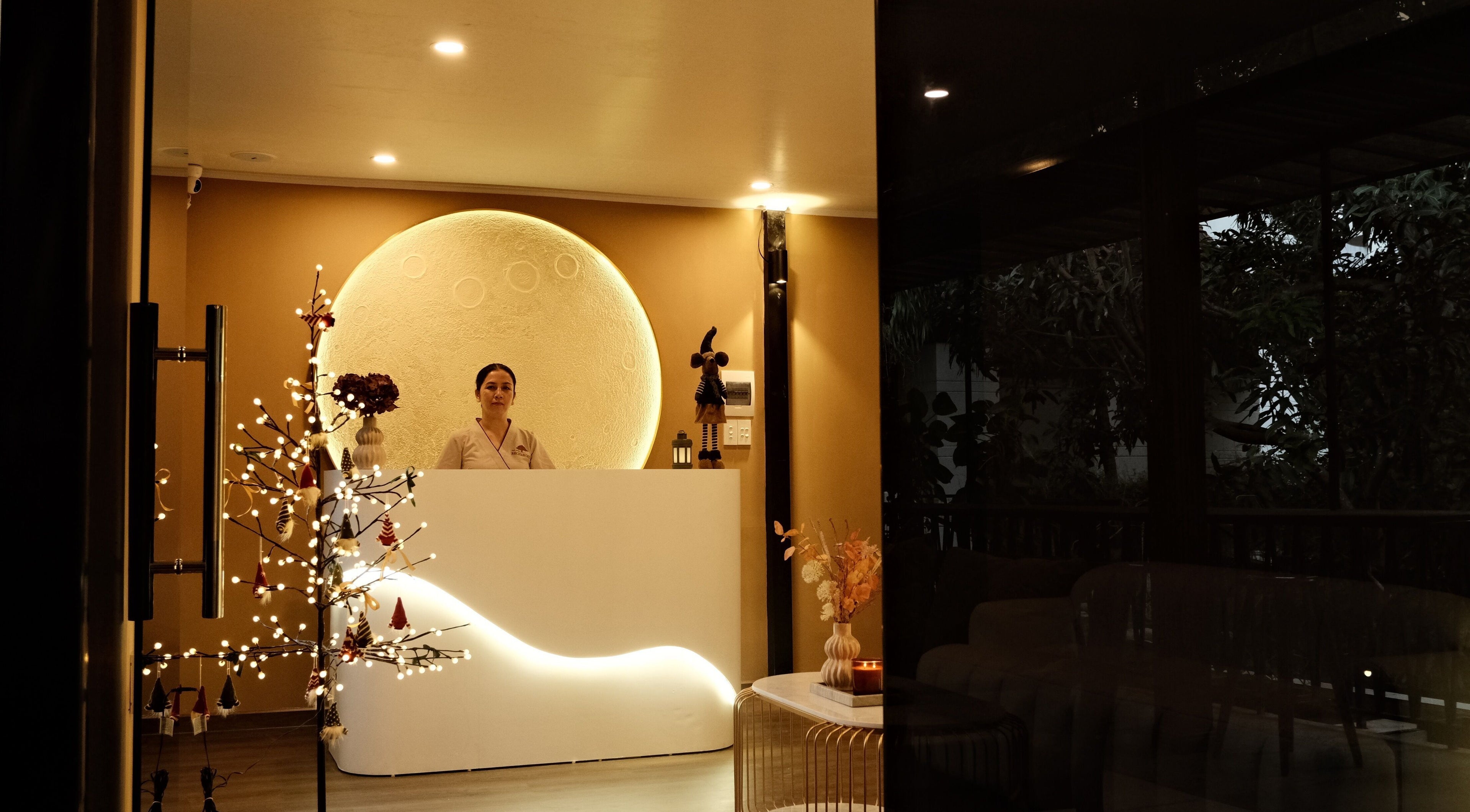 Recharged SPA reception with warm lighting in Đà Nẵng, Đà Nẵng, VN for a welcoming atmosphere.