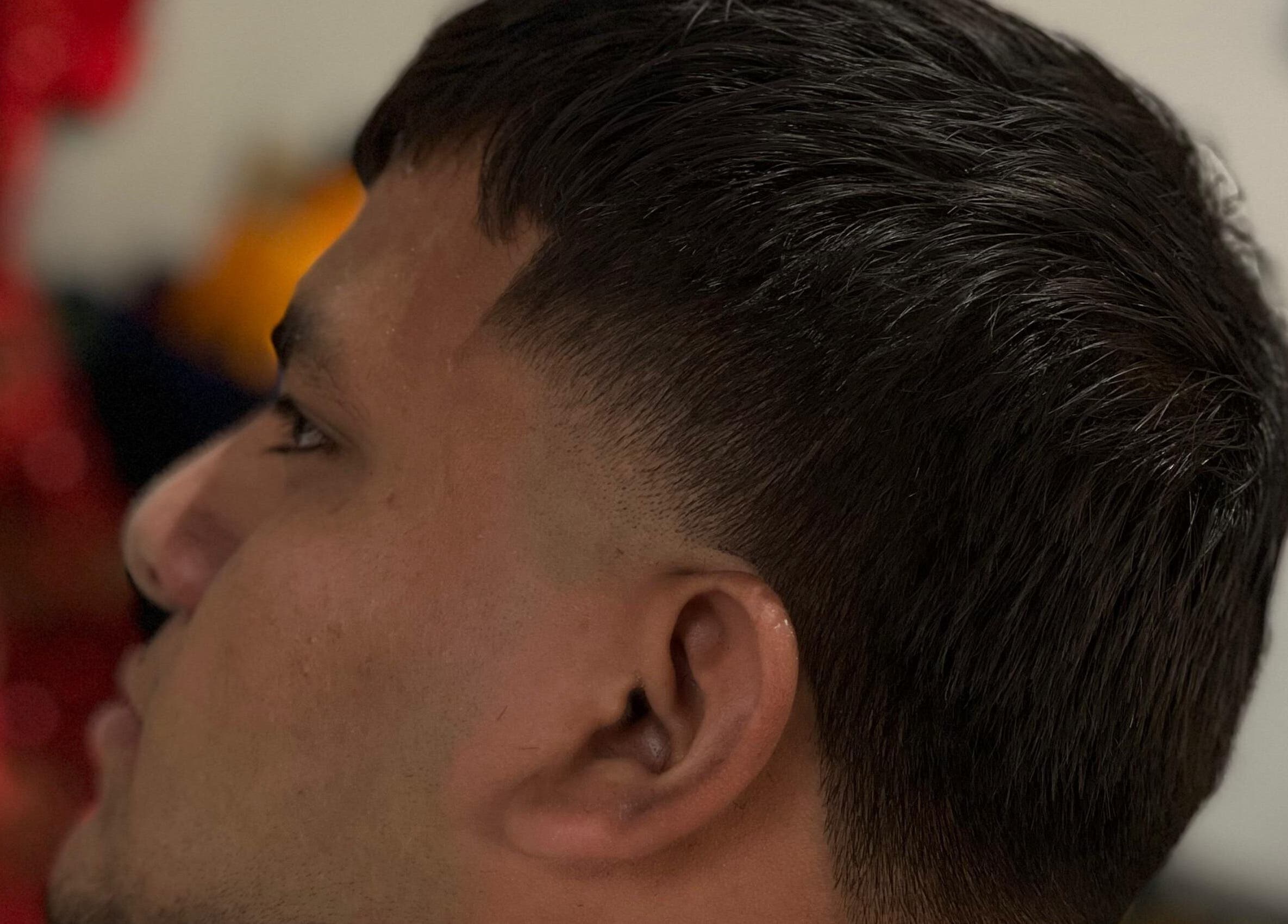 Close-up of a stylish haircut with a fade at Hache Barber, Panamá, Provincia De Panamá, PA.