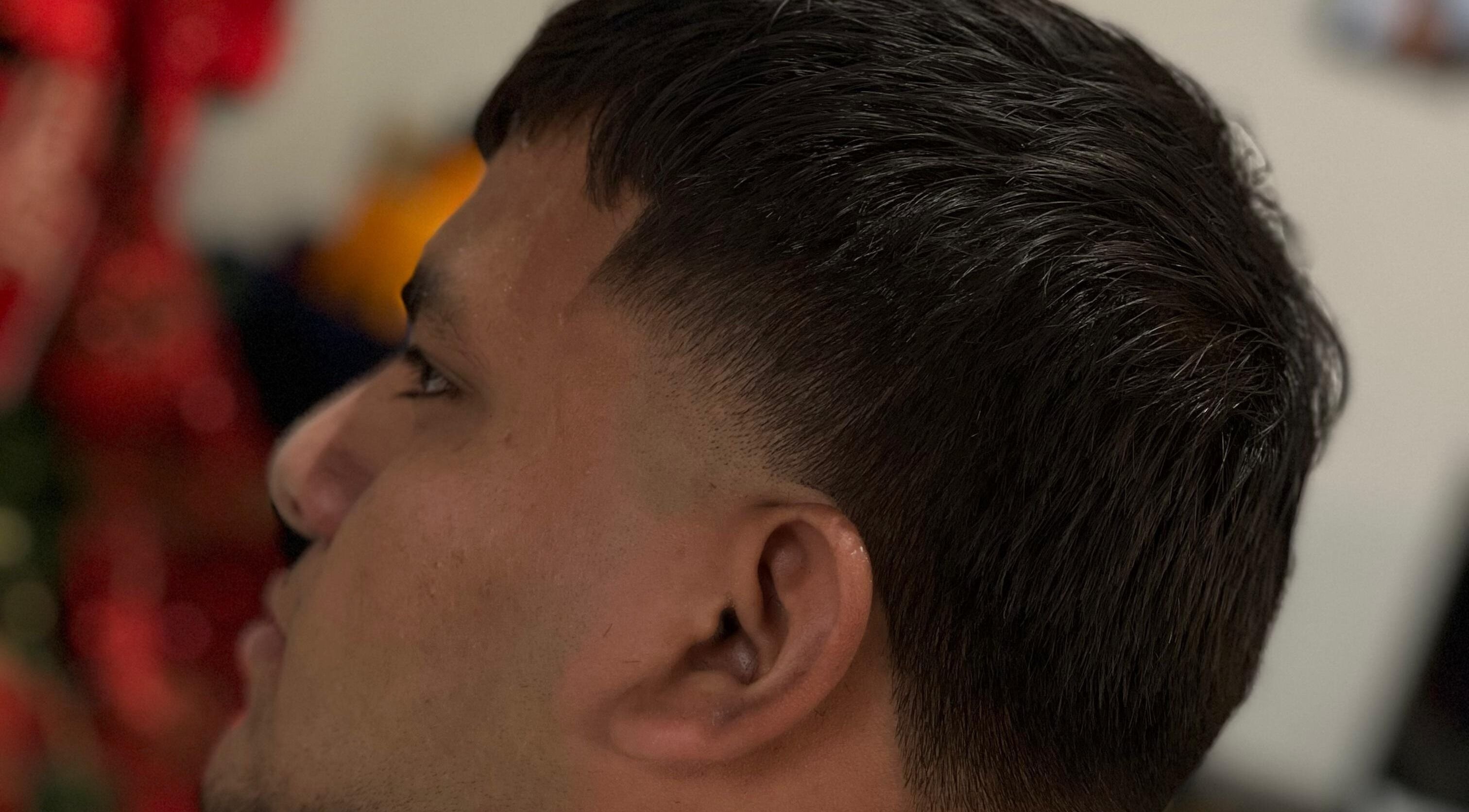 Close-up of a stylish haircut with a fade at Hache Barber, Panamá, Provincia De Panamá, PA.