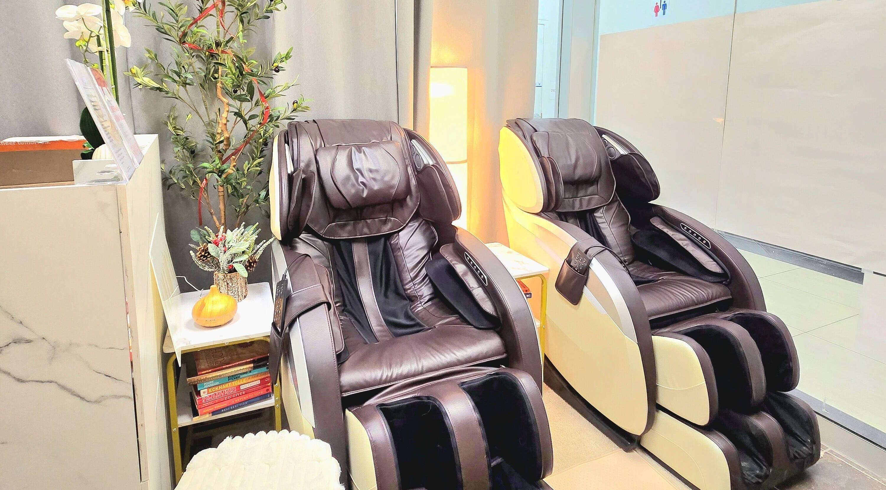 Luxury massage chairs at Emira Ethereal Wellness in Markham, Ontario, CA offer the ultimate relaxation experience.