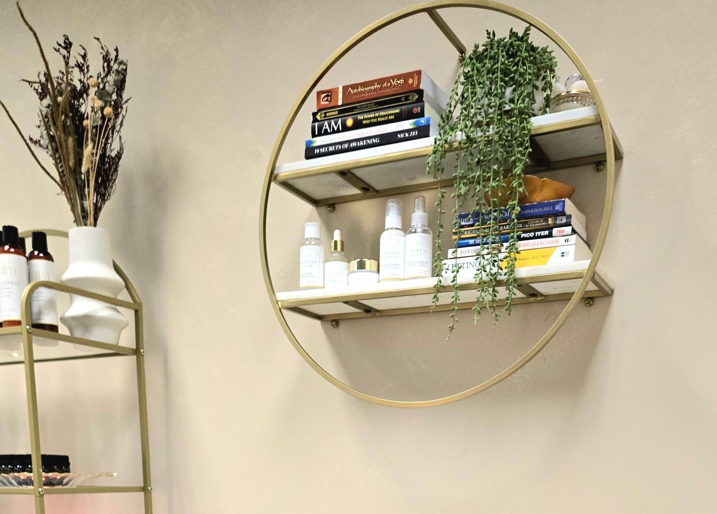 Elegant shelf with beauty products at Emira Ethereal Wellness, Markham, Ontario, CA showcasing serene decor.