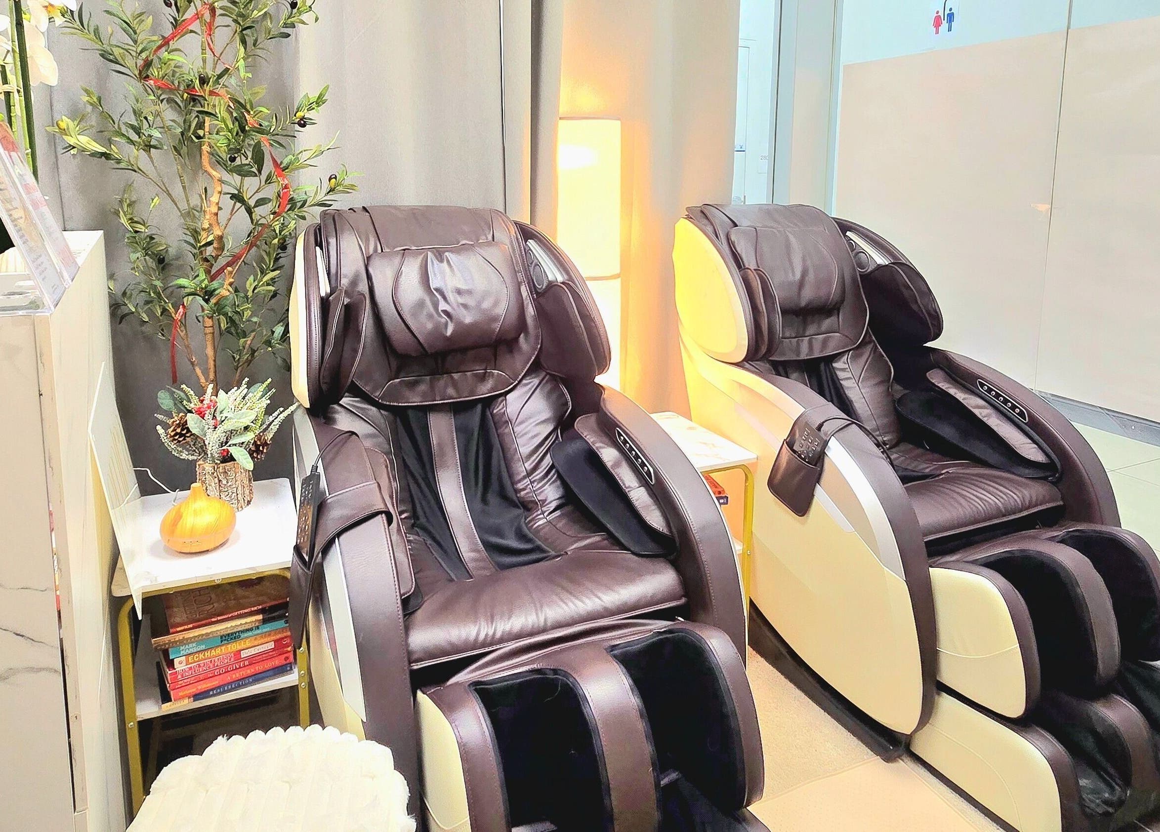 Comfortable massage chairs at Emira Ethereal Wellness in Markham, Ontario, CA, providing ultimate relaxation.