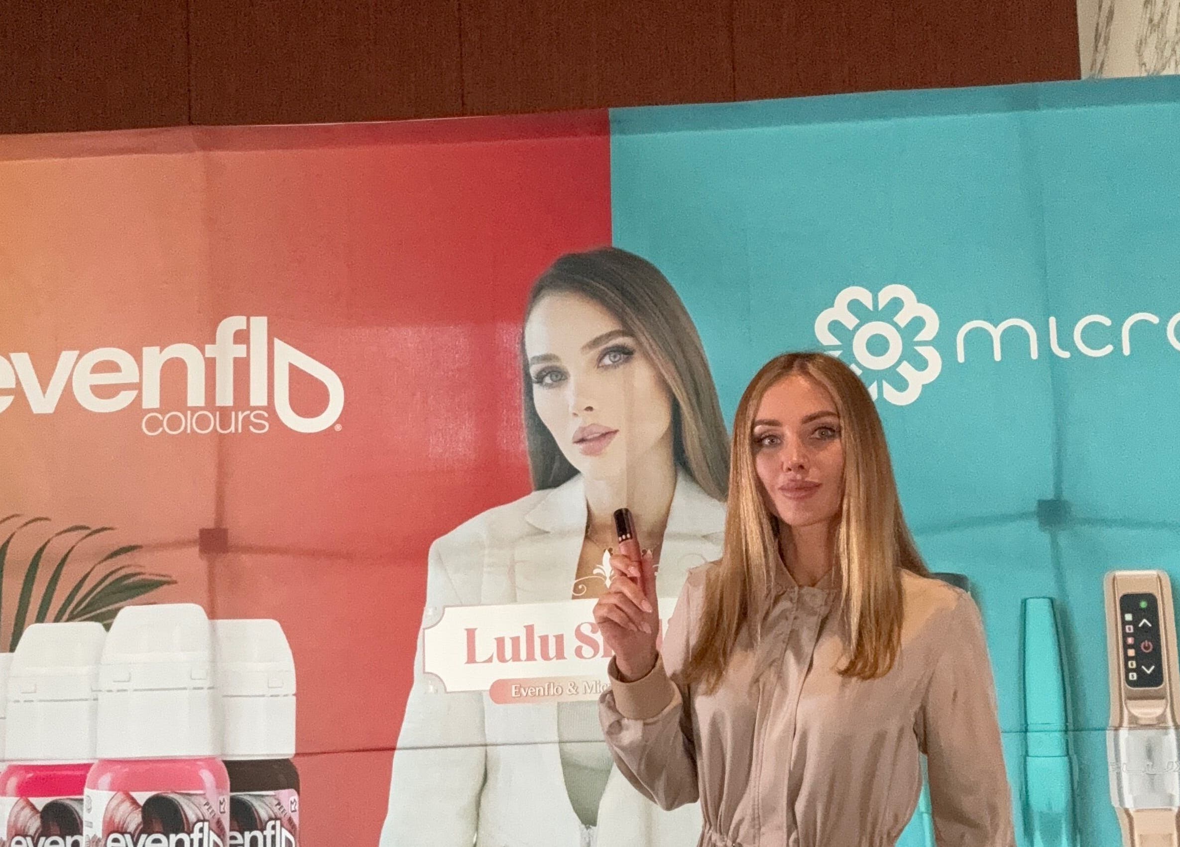 Colorful promotional display at Beauty Works, Miami, Florida, US featuring beauty products and signage.