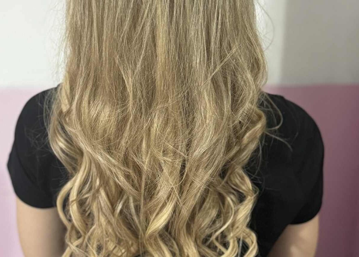 Blonde wavy hairstyle at Hybrid Hair By Lea in Cradley Heath, England, GB.