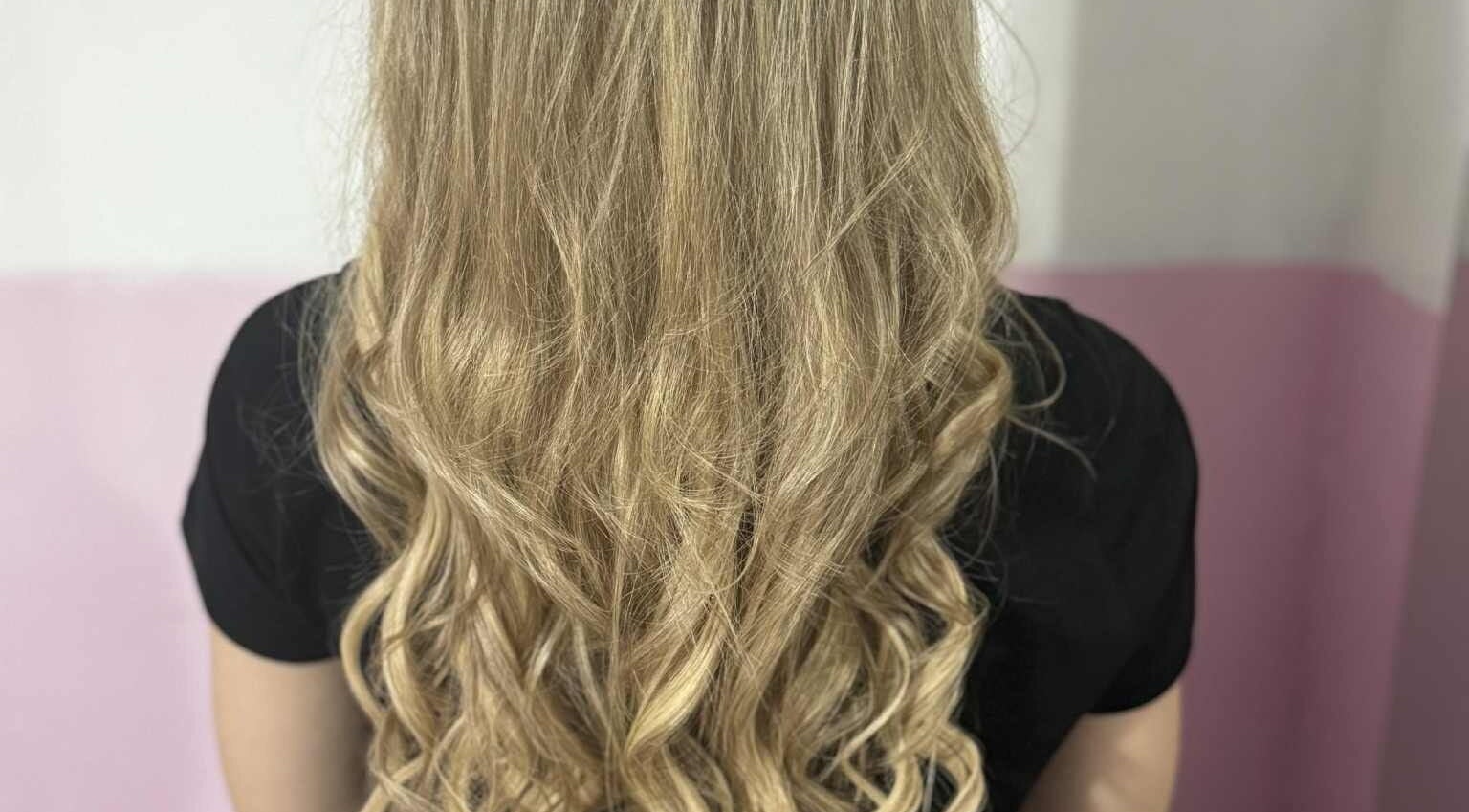 Blonde wavy hairstyle at Hybrid Hair By Lea in Cradley Heath, England, GB.