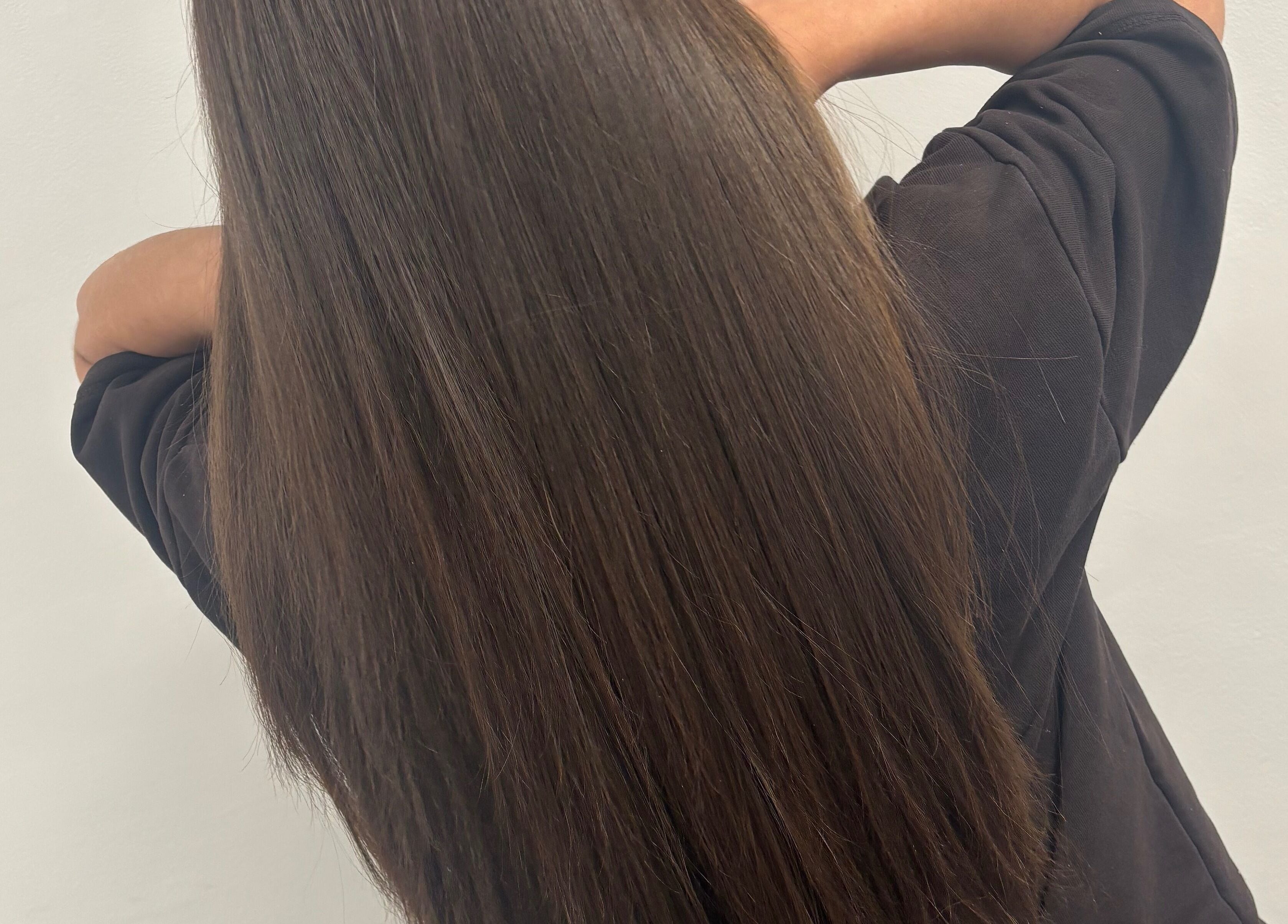 Smooth, glossy hair showcased at Hybrid Hair By Lea, Cradley Heath, England, GB.