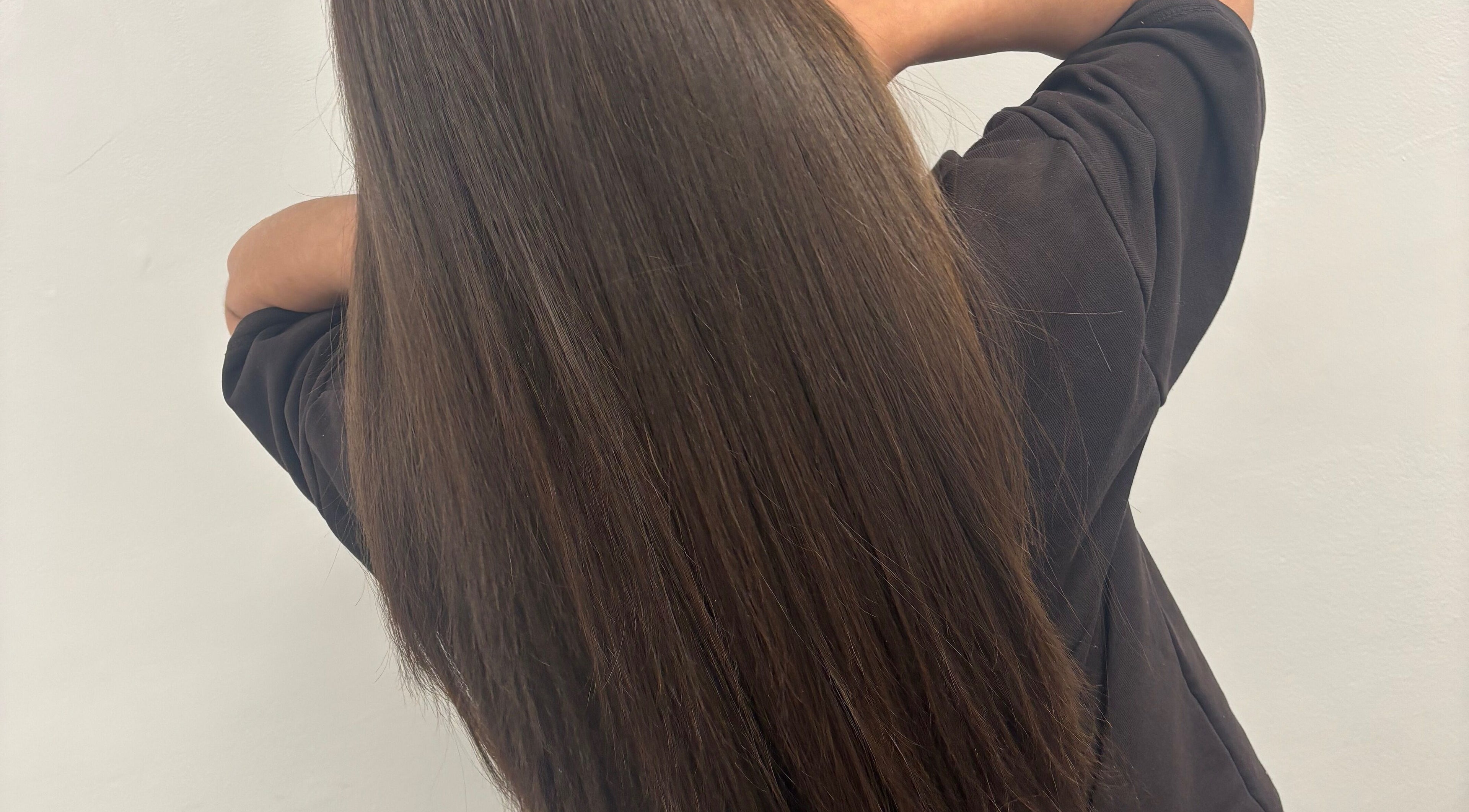 Smooth, glossy hair showcased at Hybrid Hair By Lea, Cradley Heath, England, GB.