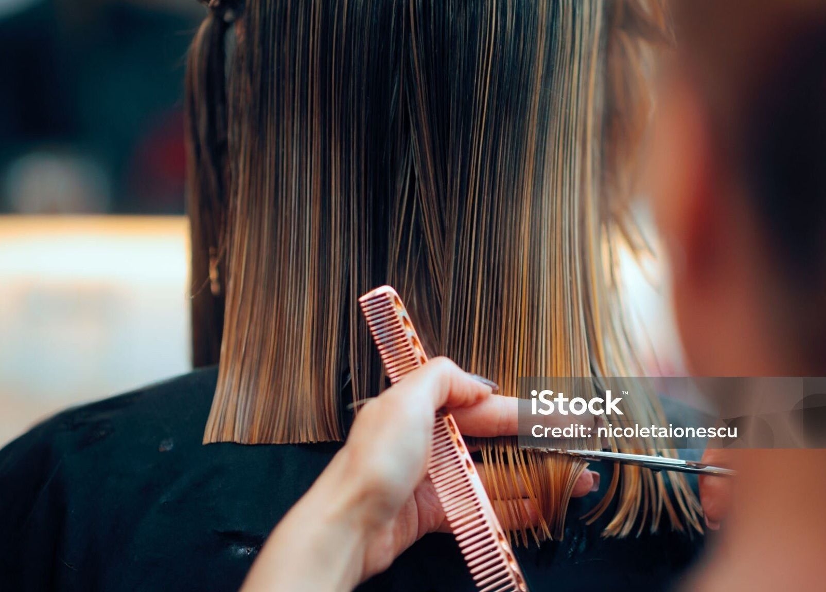 A stylist performs a precise haircut at Dan Hair Style in Birmingham, England, GB.