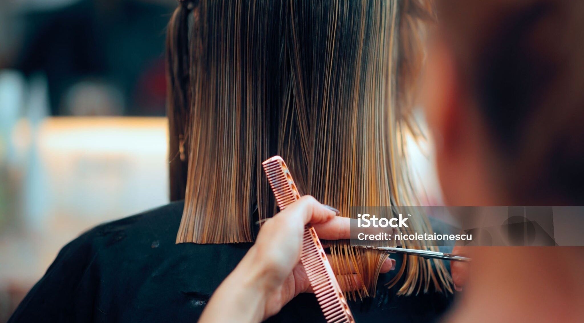 A stylist performs a precise haircut at Dan Hair Style in Birmingham, England, GB.