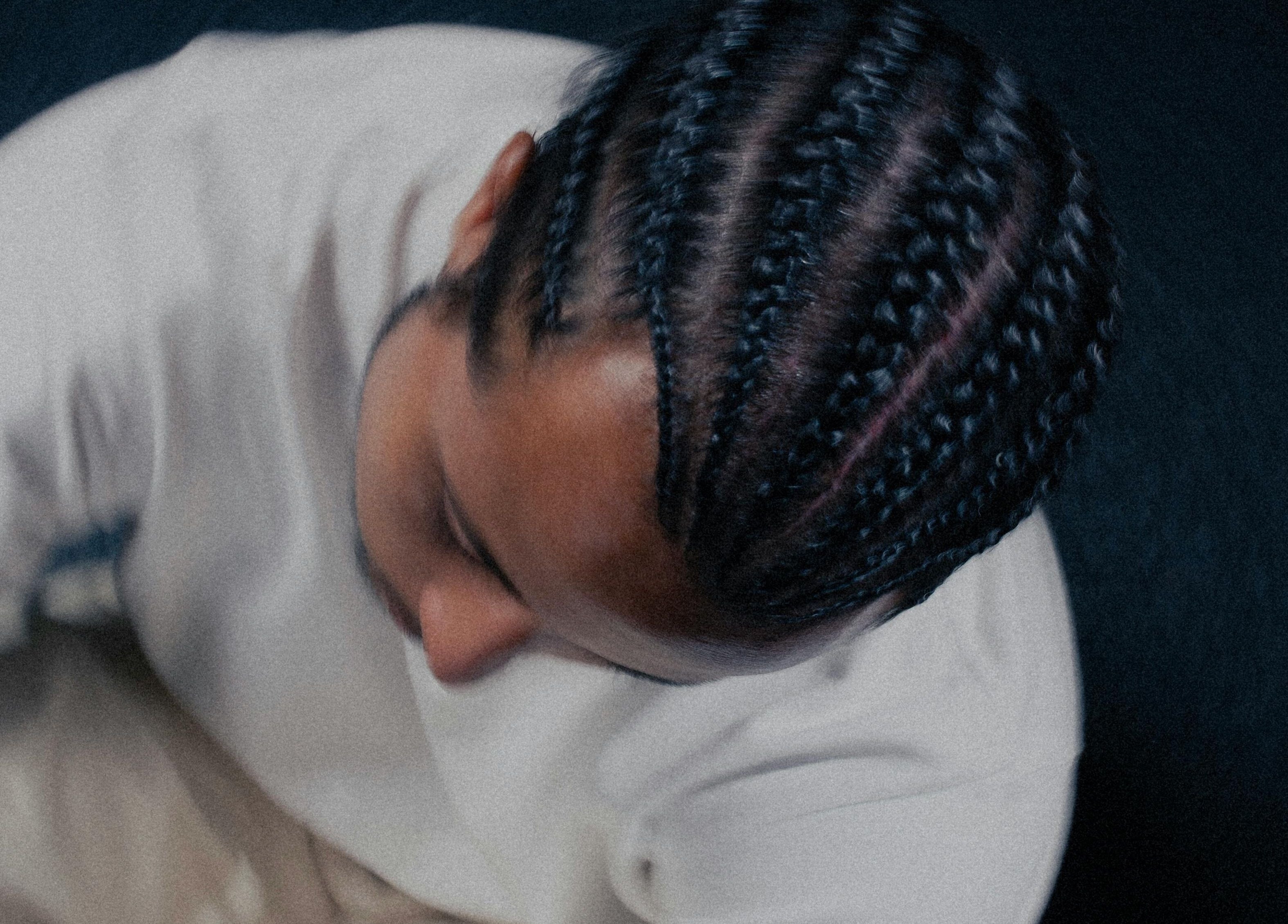 Stylish braids hairstyle at Dan Hair Style in Birmingham, England, GB, showcasing intricate hair patterns.