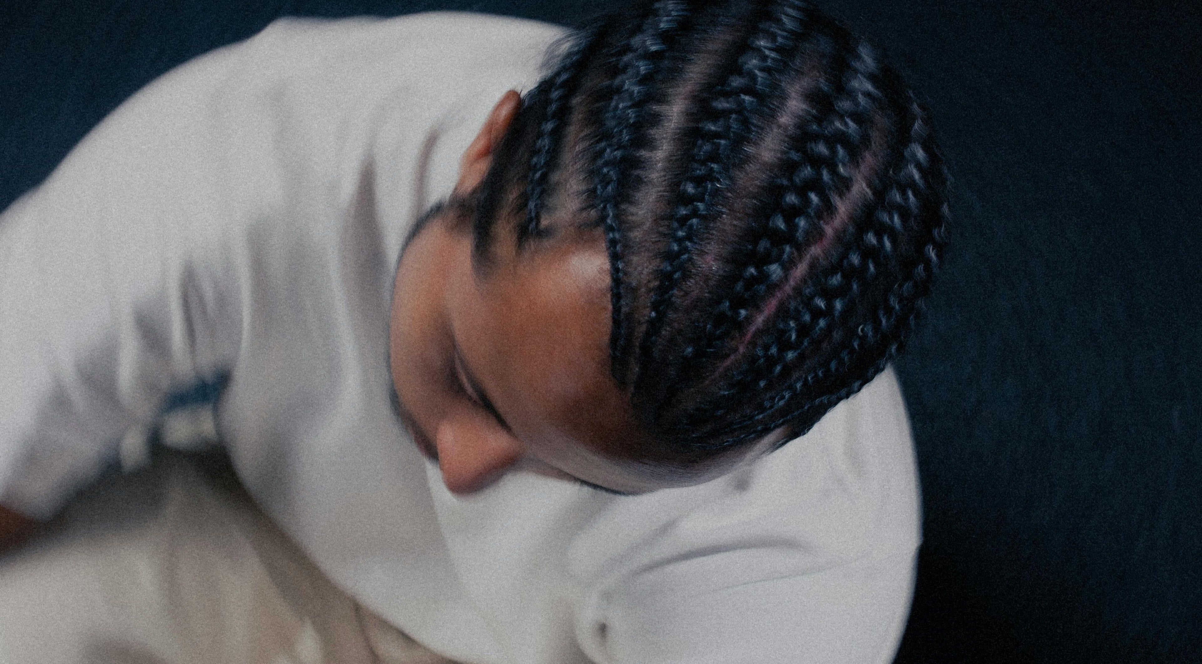 Stylish braids hairstyle at Dan Hair Style in Birmingham, England, GB, showcasing intricate hair patterns.