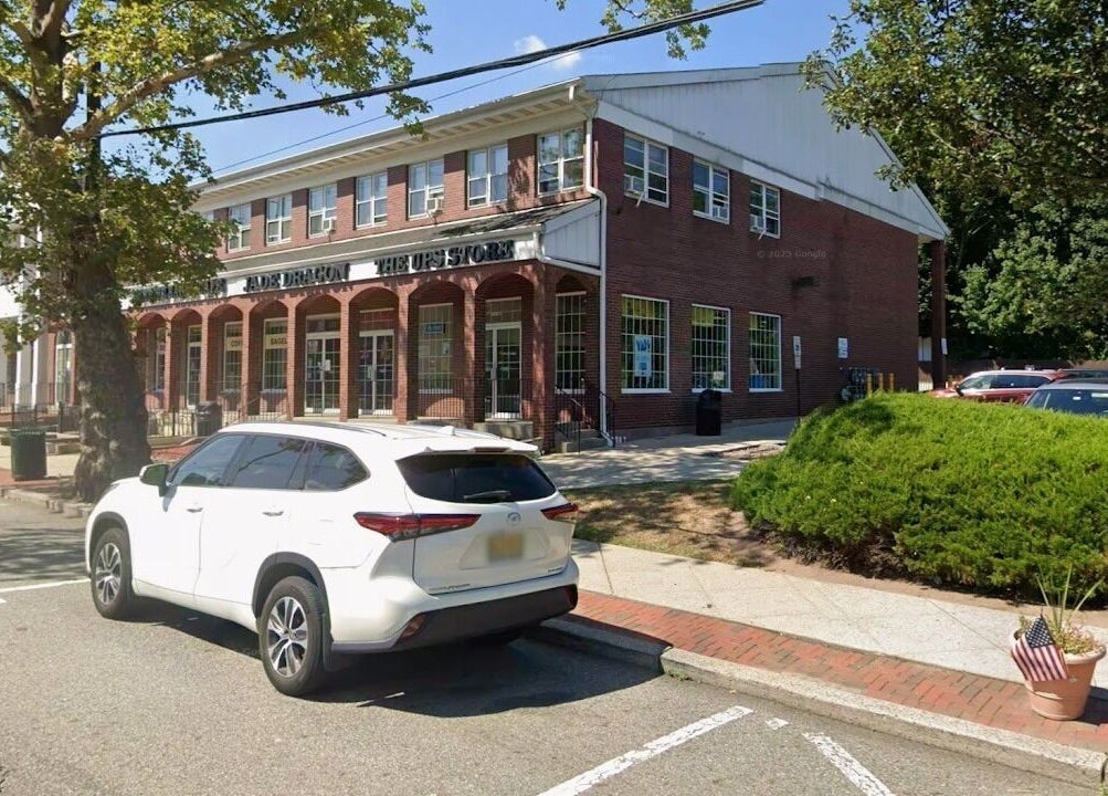 Pro Wax Studio located in a charming brick building on a sunny day in Oradell, New Jersey, US.