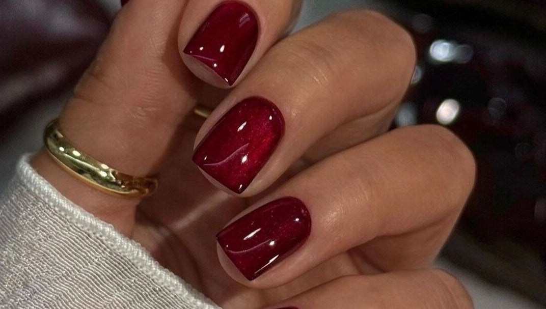 Elegant red manicure at UR HONESTY BEAUTY CO. STUDIO, Roodepoort, Gauteng, ZA. Perfect for style and sophistication.