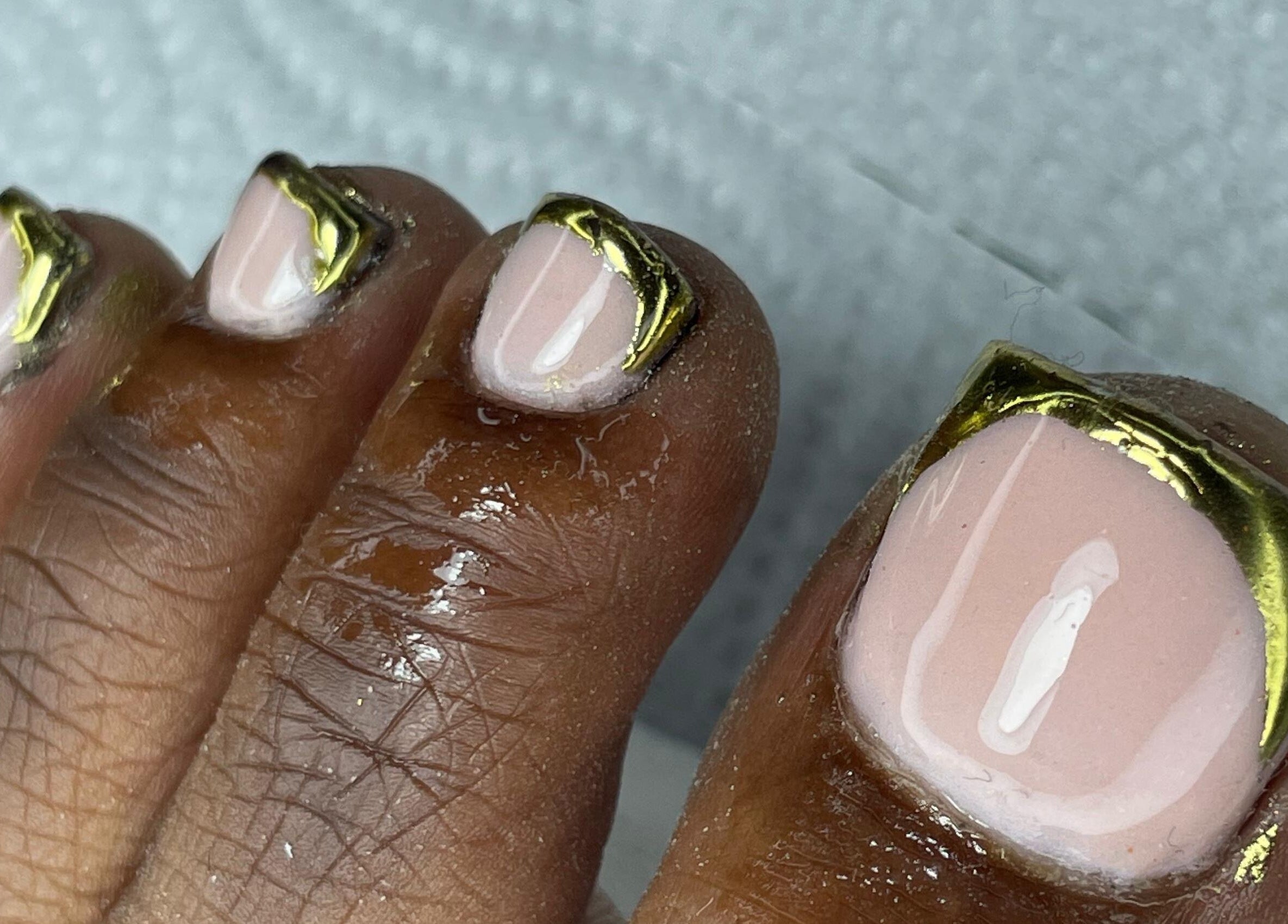 Gold-edged toenail design at UR HONESTY BEAUTY CO. STUDIO, Roodepoort, Gauteng, ZA.