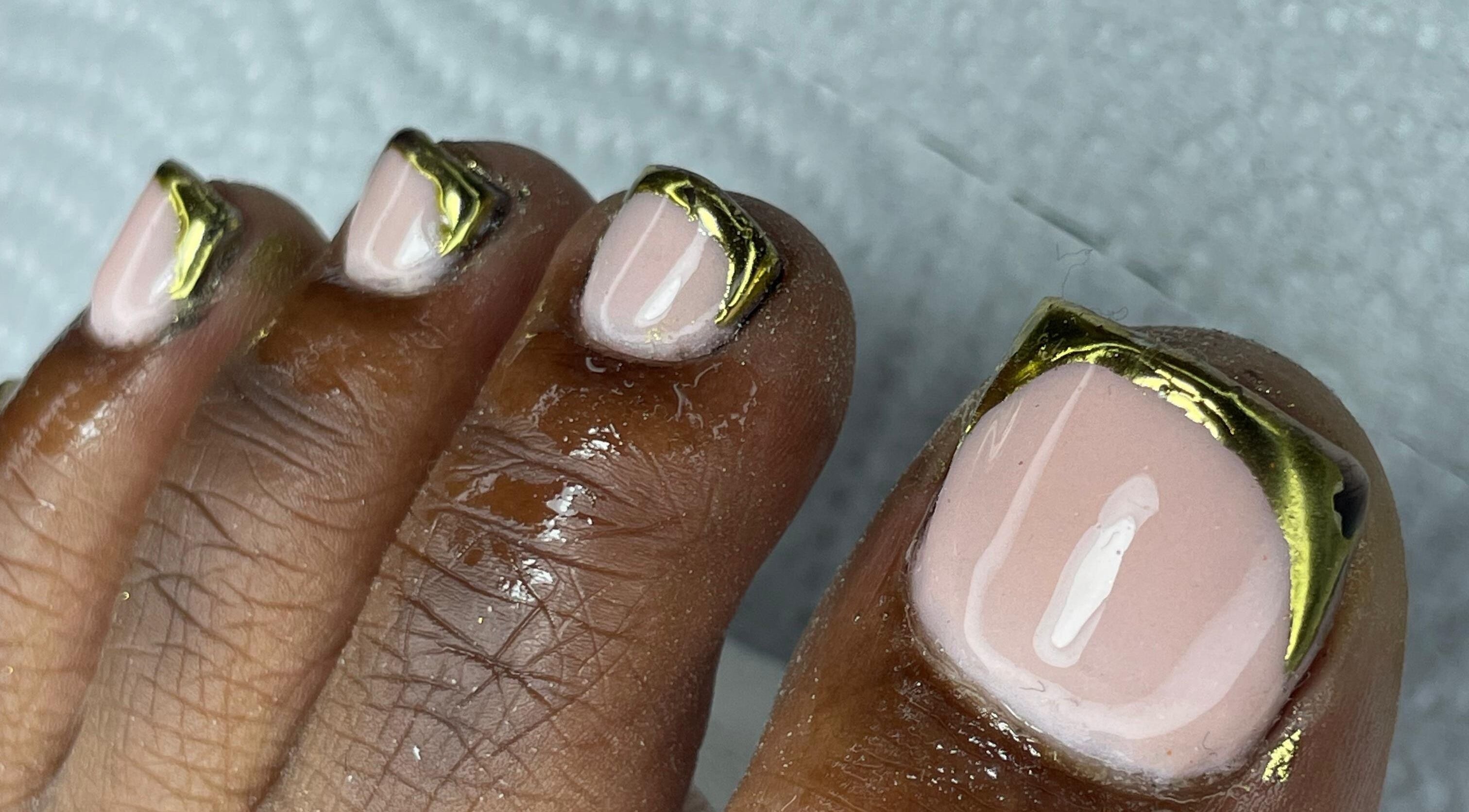 Gold-edged toenail design at UR HONESTY BEAUTY CO. STUDIO, Roodepoort, Gauteng, ZA.