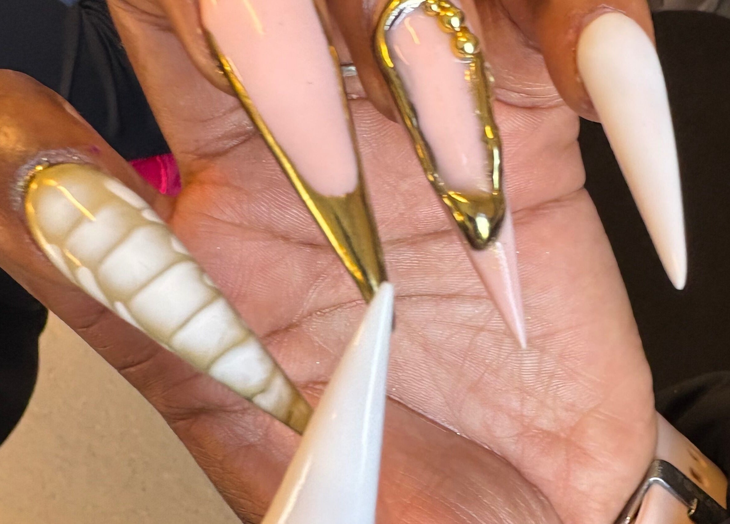 Elegant gold-accented nail art at UR HONESTY BEAUTY CO. STUDIO, Roodepoort, Gauteng, ZA.