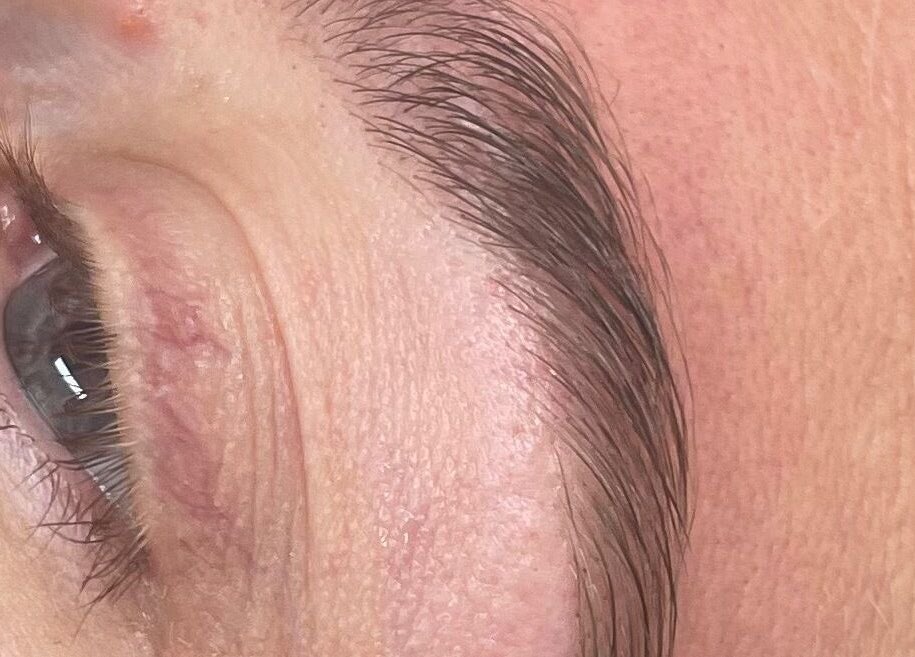 Close-up of expertly shaped eyebrow at Coco’s Beauty, Clanfield, England, GB.