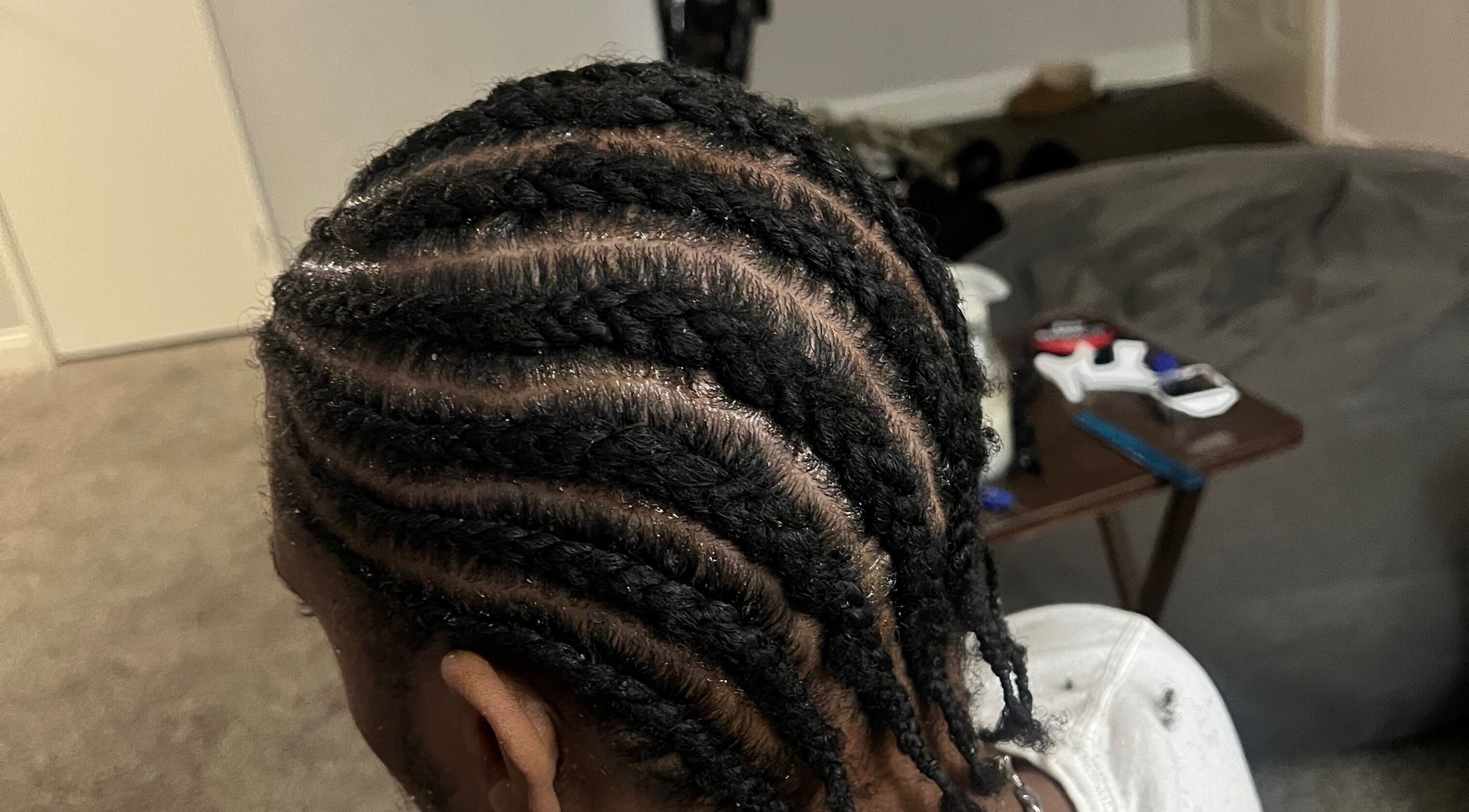 Detailed cornrow braid style at Loc’d in by Dej, Las Vegas, Nevada, US.