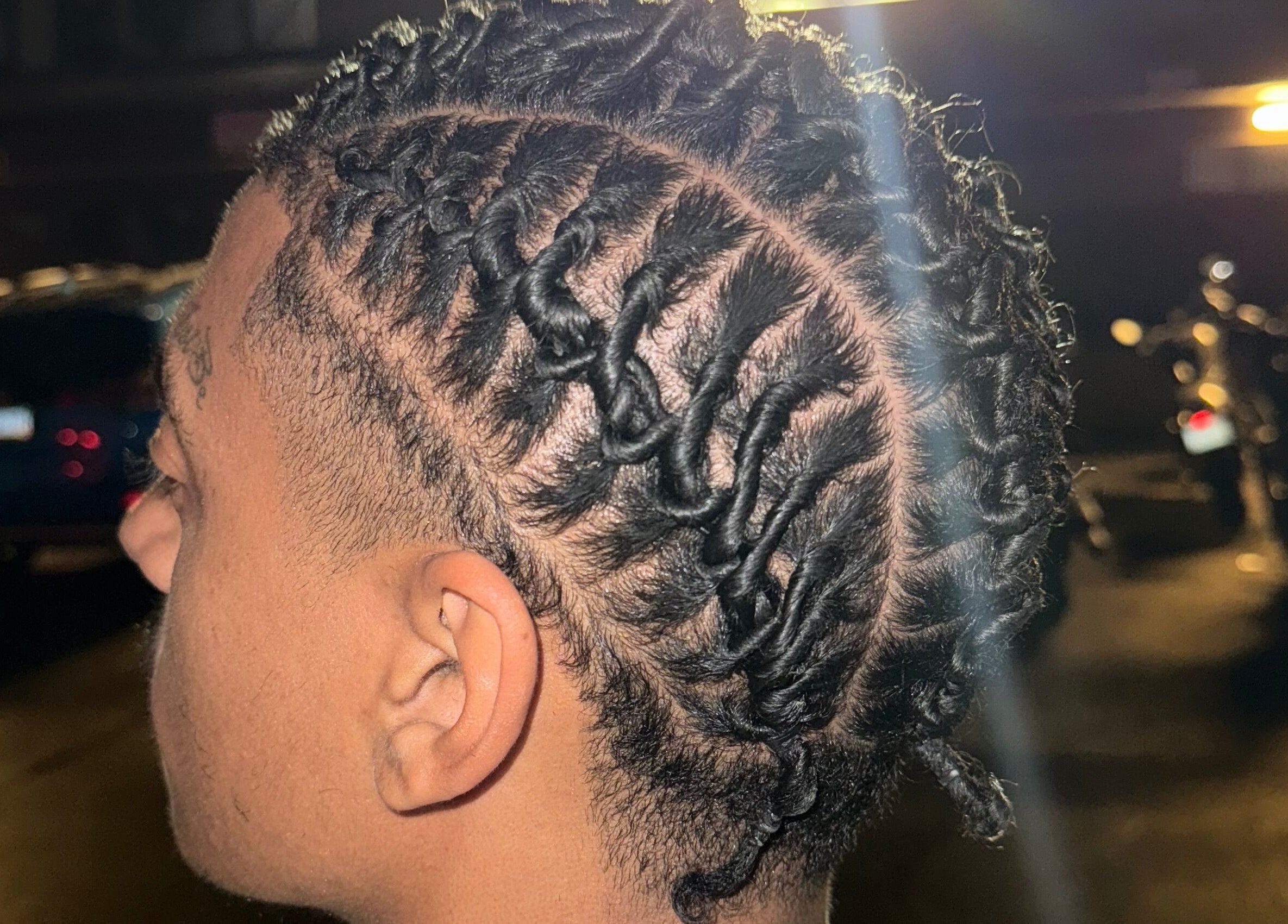 Close-up of intricate locs at Loc’d in by Dej, Paradise, Nevada, US, showcasing detailed hair artistry.