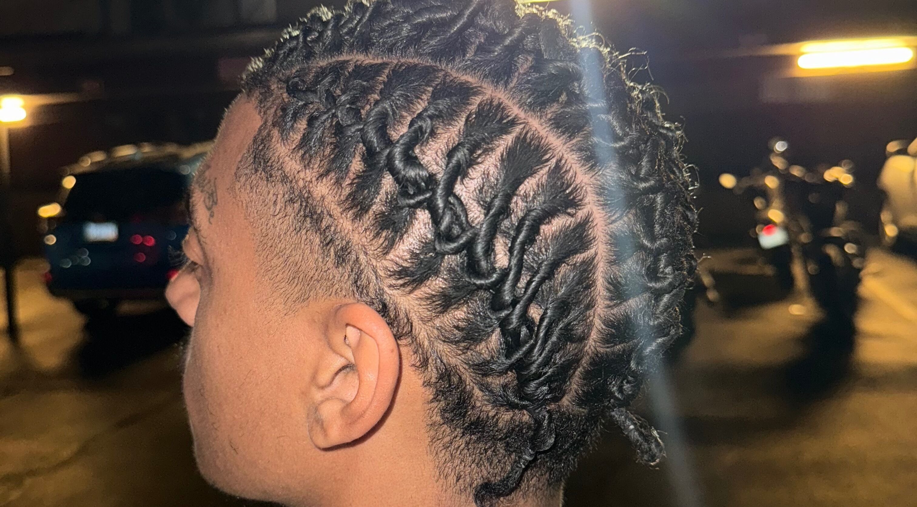 Close-up of intricate locs at Loc’d in by Dej, Paradise, Nevada, US, showcasing detailed hair artistry.