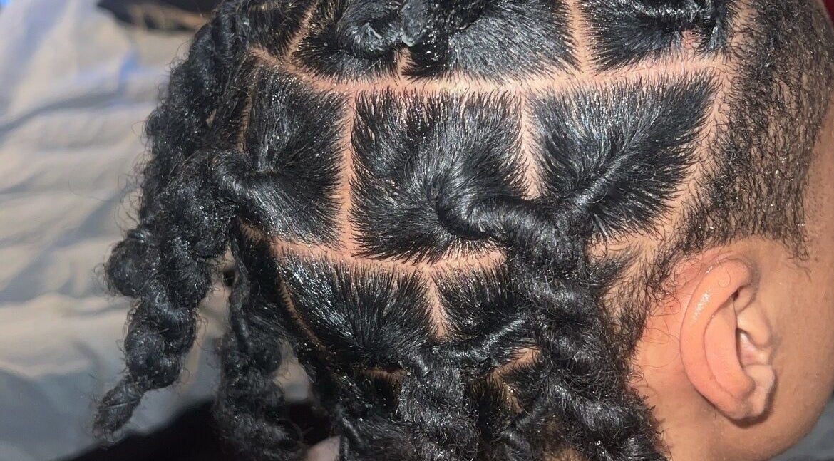 Intricate twist hairstyle at Loc’d in by Dej, Paradise, Nevada, US. Expertly styled for a refined look.