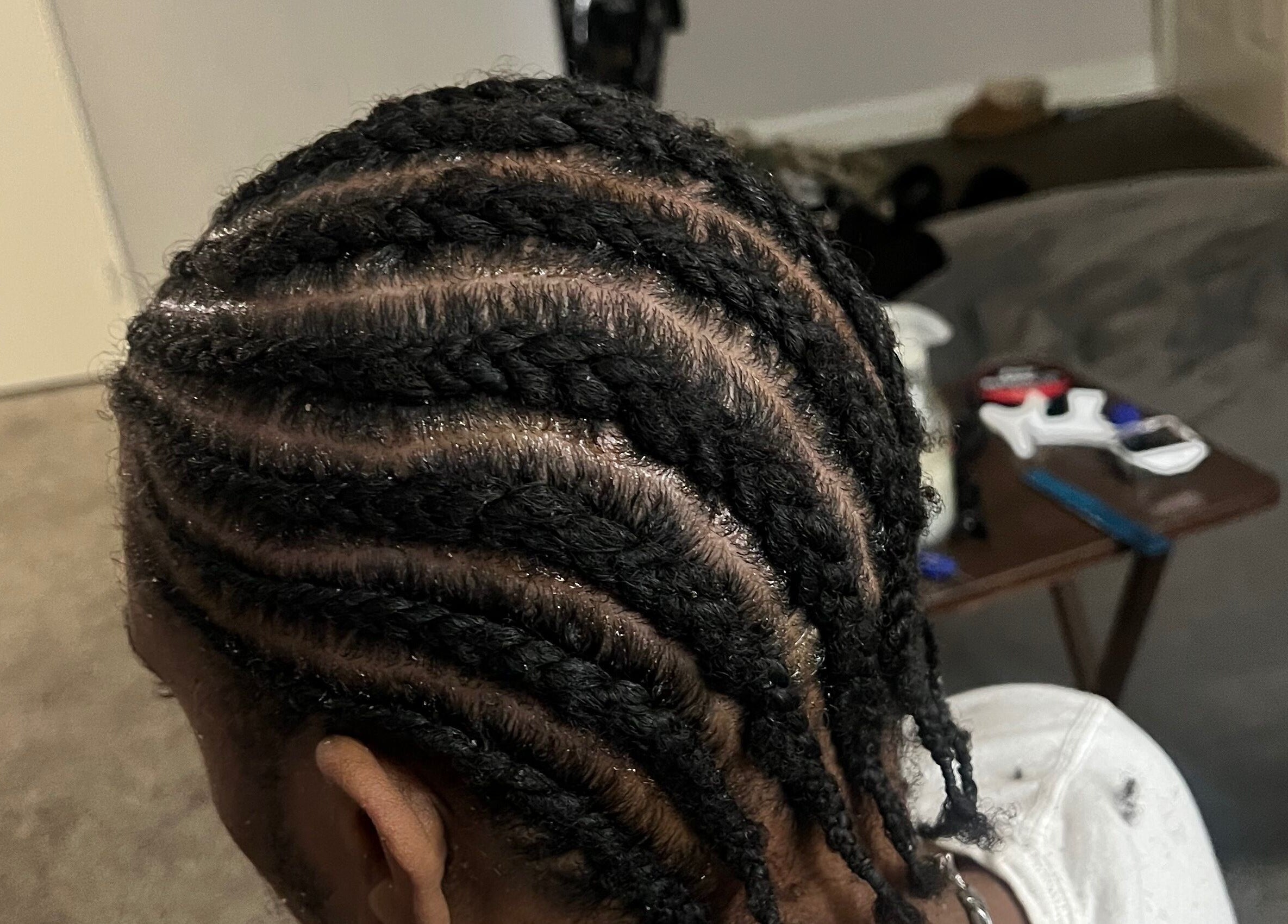 Detailed cornrow braids hairstyle at Loc’d in by Dej, Paradise, Nevada, US.