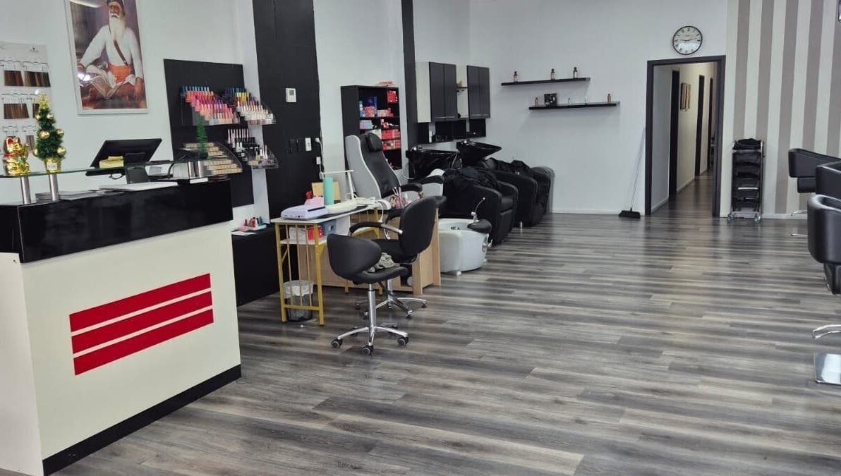 Modern interior of Luxe Hair & Beauty Salon in Hamilton, Waikato Region, NZ with sleek stations and stylish decor.