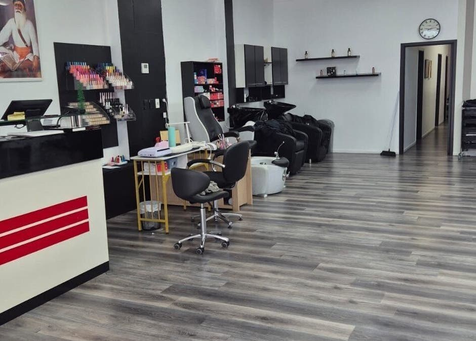 Modern interior of Luxe Hair & Beauty Salon in Hamilton, Waikato Region, NZ with sleek stations and stylish decor.