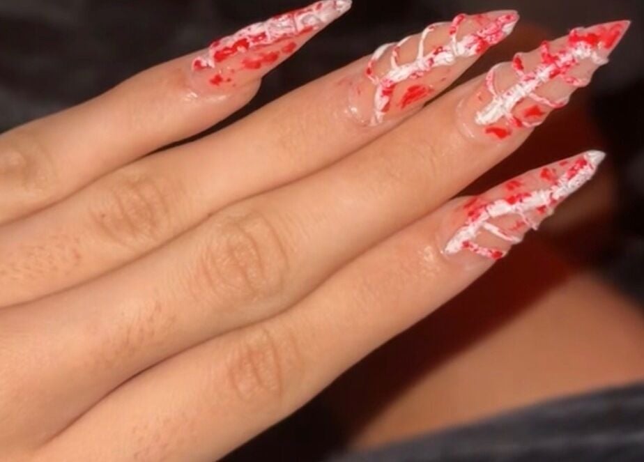 Unique red and white acrylic nails by Kaicrylics, Port Charlotte, Florida, US.