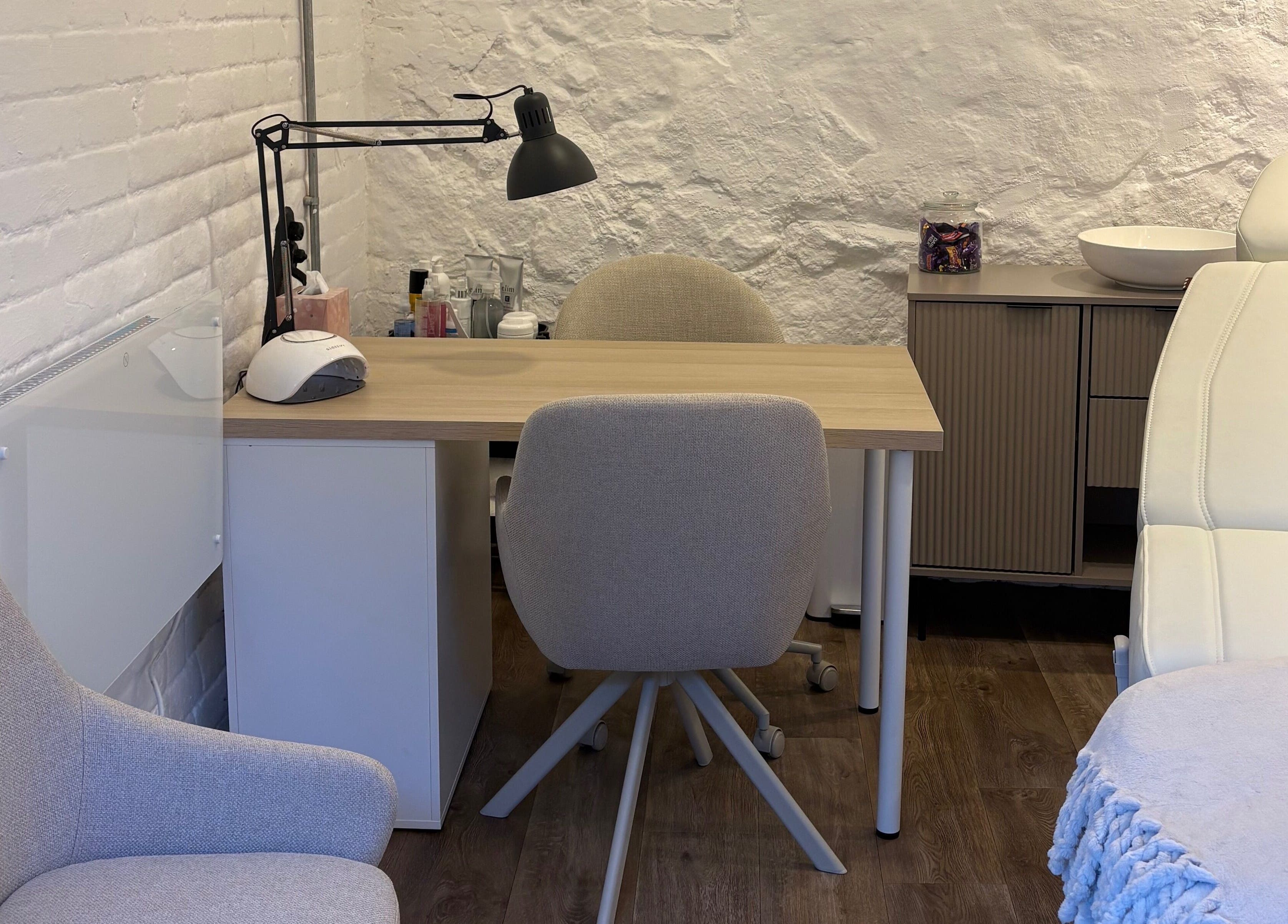 Chic beauty treatment area at Made Creative Beauty, Rothley, England, GB showcasing modern decor and equipment.