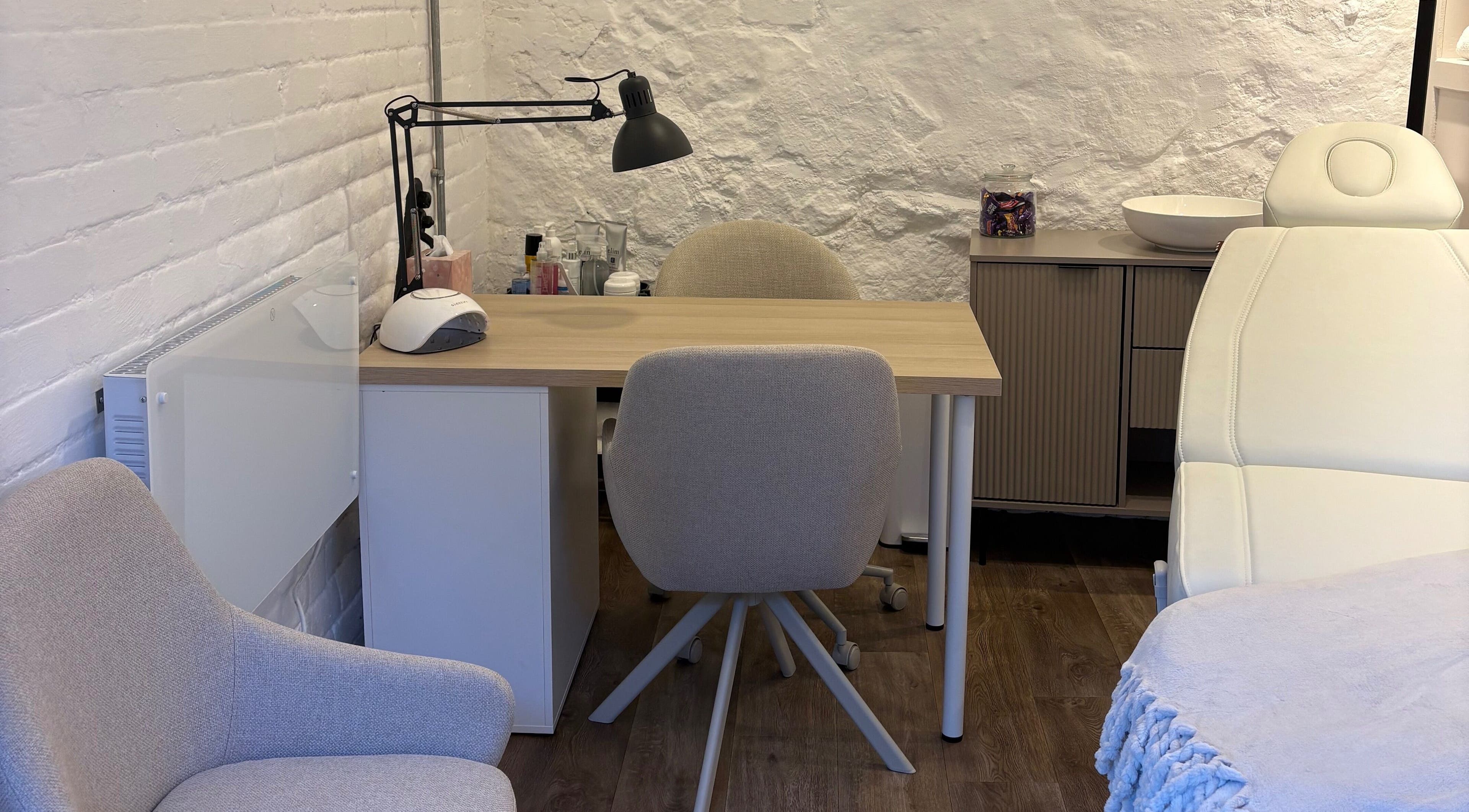 Chic beauty treatment area at Made Creative Beauty, Rothley, England, GB showcasing modern decor and equipment.