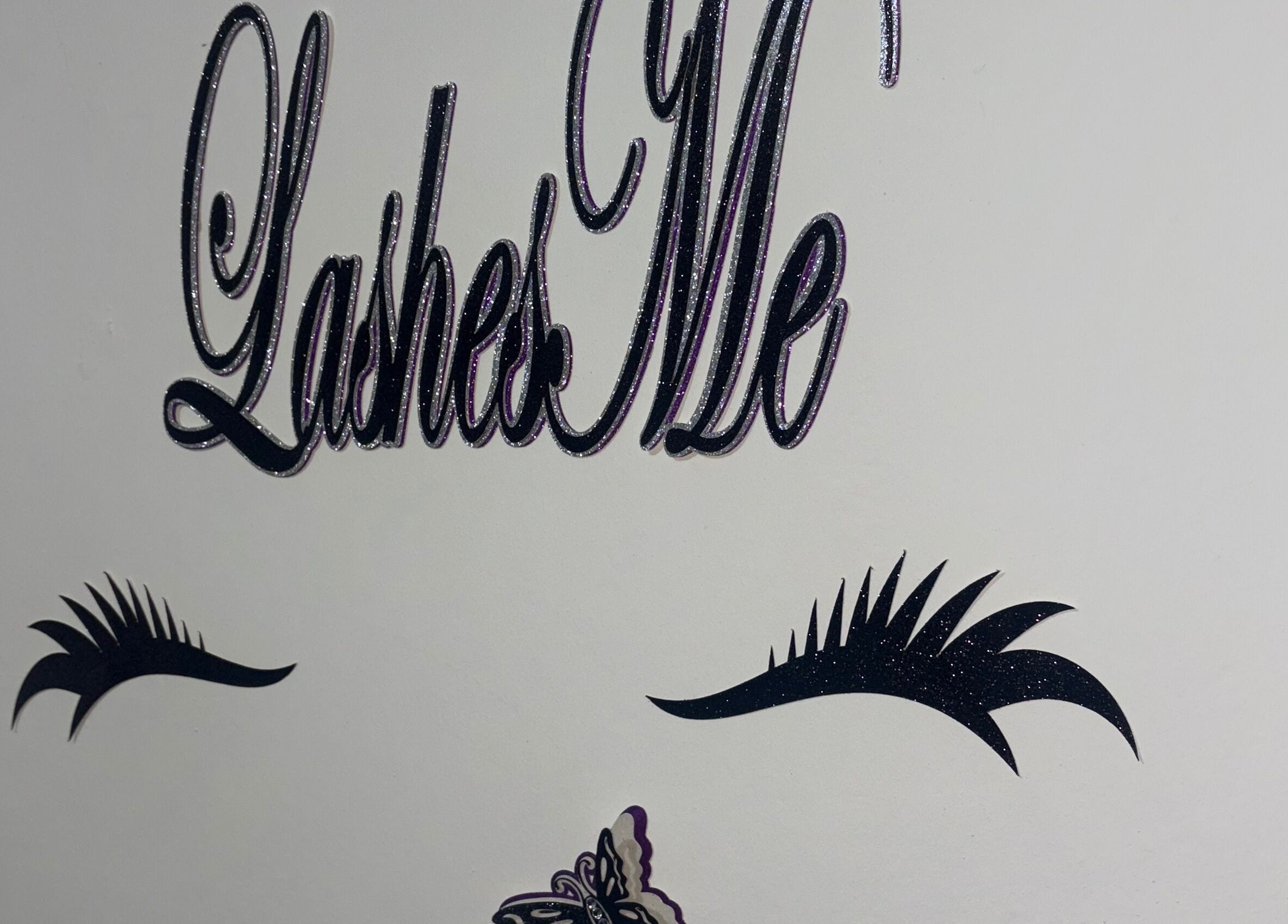 Lashesmett venue wall art featuring stylish eyelashes in San Juan, San Juan-laventille Regional Corporation, TT.