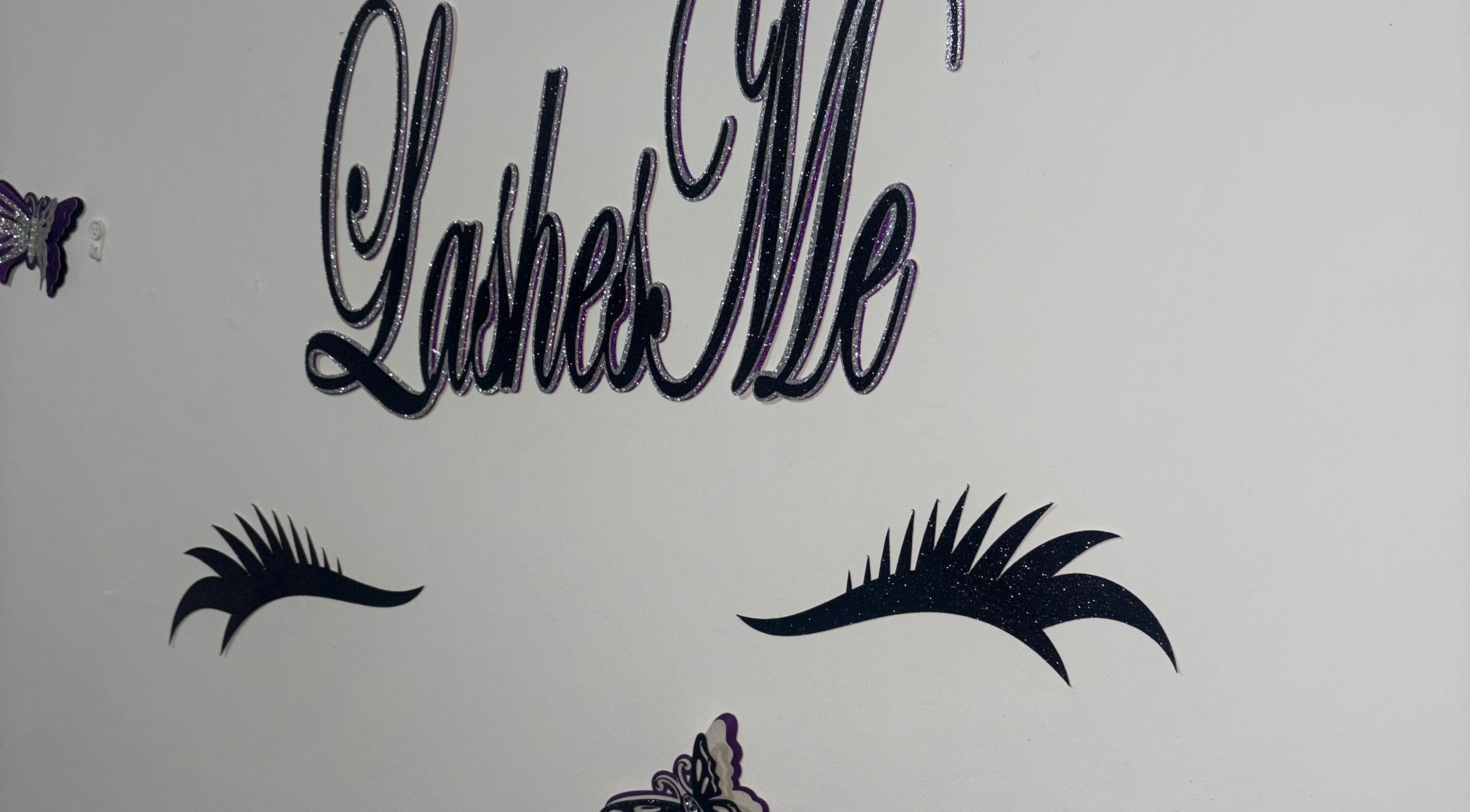 Lashesmett venue wall art featuring stylish eyelashes in San Juan, San Juan-laventille Regional Corporation, TT.